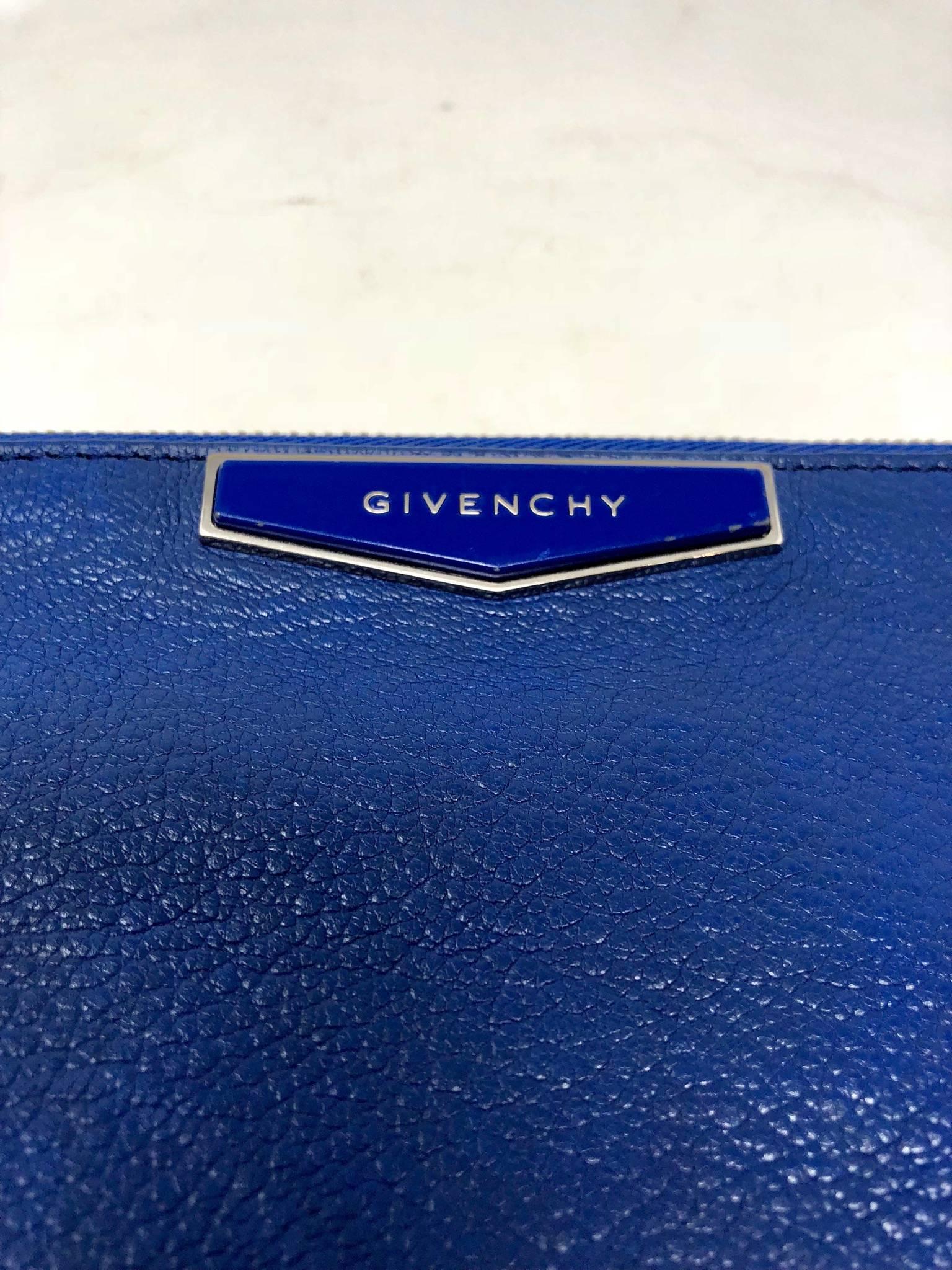 Givenchy blue pouch/ clutch for Ipad holder or fashion bag. Electric blue color.  Leather and silver accent.