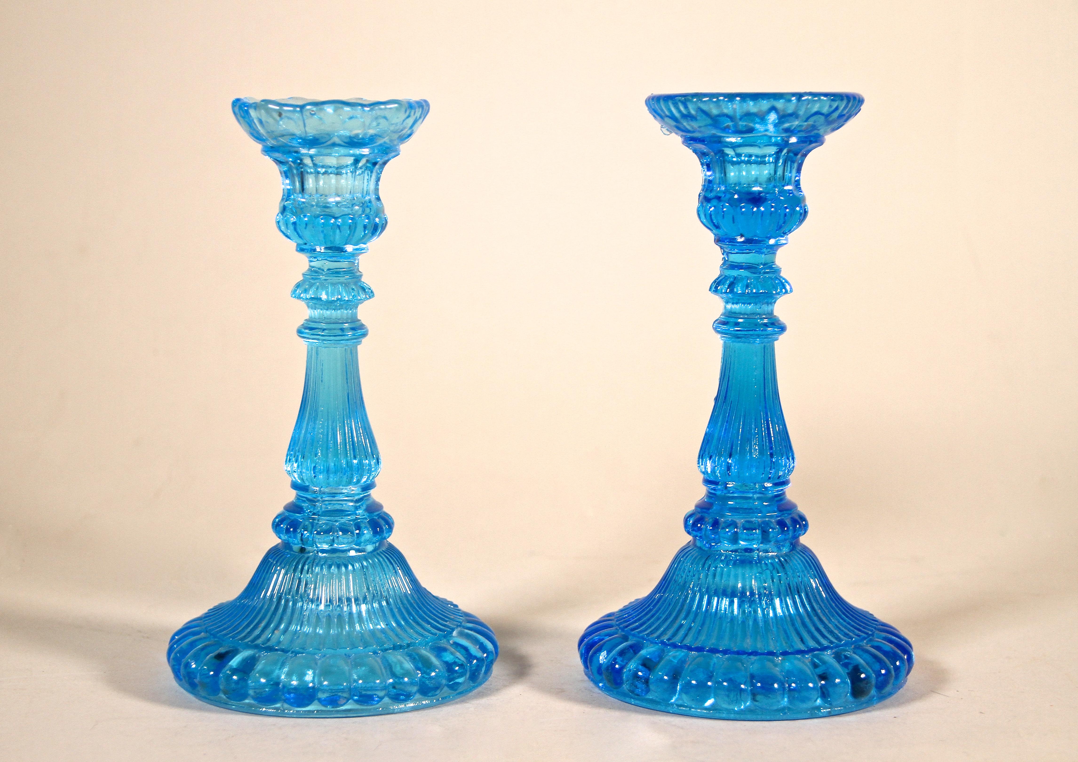 blue candlestick holders