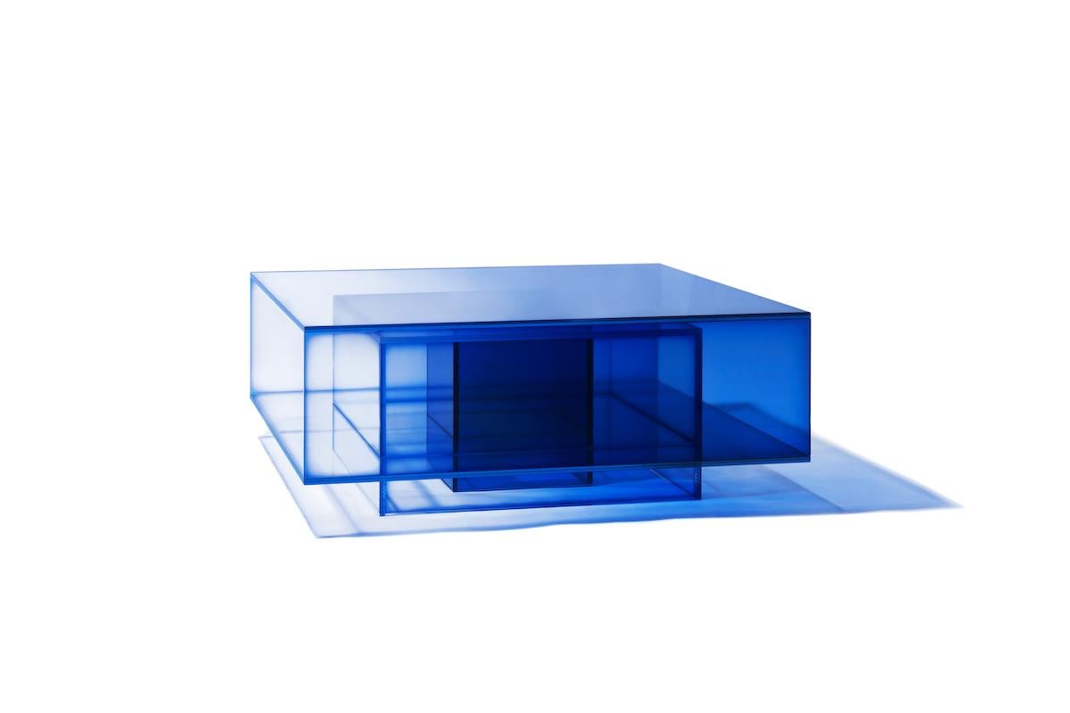 This coffee table is made of laminated glass in blue color. Size and color are customizable upon request. 

Studio Buzao is an experimental design studio. It tempts to breakthrough the difference between product and artwork by immersing the