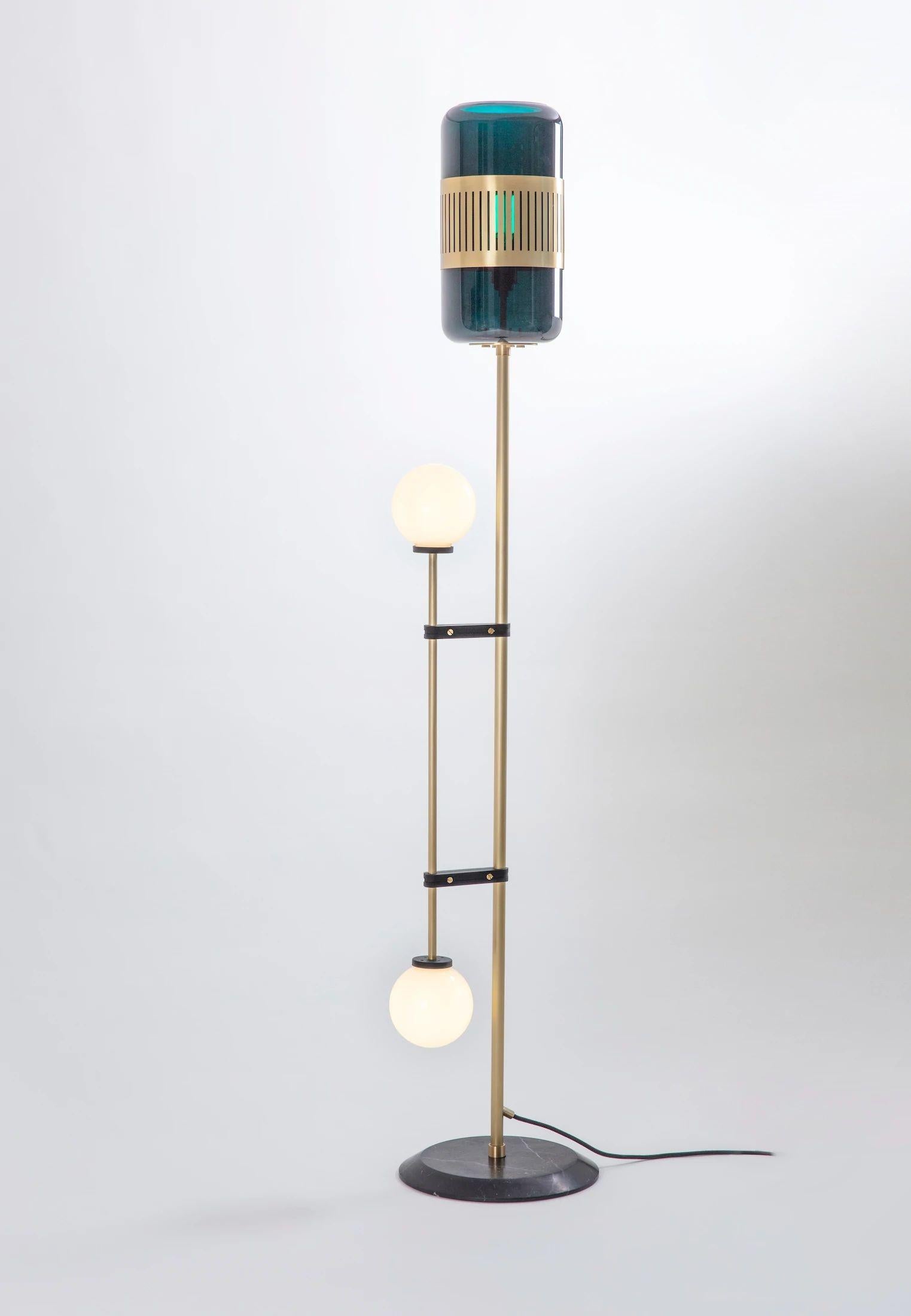 Amber glass lizak floor lamp by Bert Frank
Dimensions: 30 x 30 x 159 cm
Materials: brass and glass

Available finishes: brass, opal and blue
All our lamps can be wired according to each country. If sold to the USA it will be wired for the USA