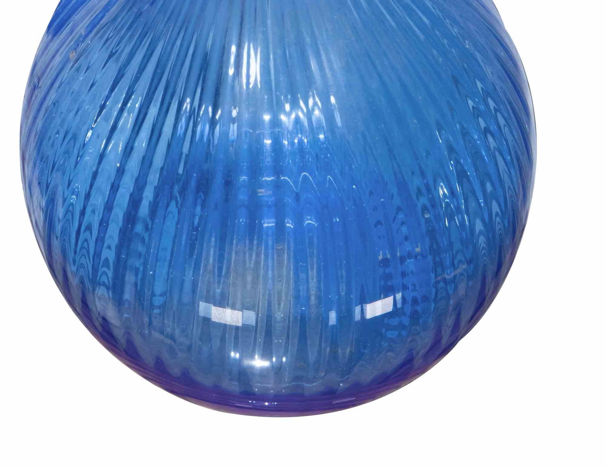Blue Glass Vase is an original design object realized in 1970s.

A beautiful light blue colored glass vase.

A unique object perfect to decor your home!.