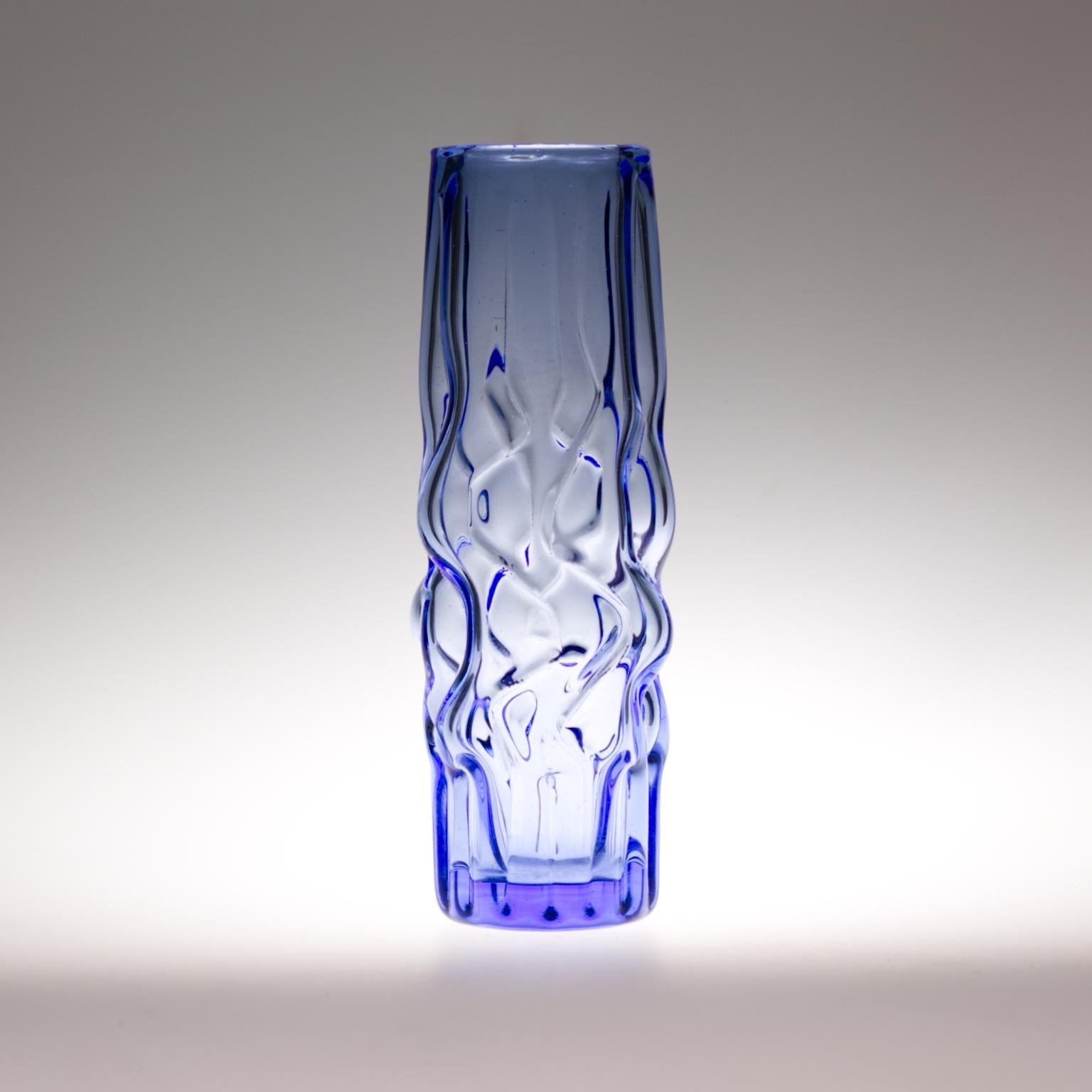 Beautiful blue color vase made in Czechoslovakia. Produced in Novy Bor in 1968, designed by Pavel Hlava. The vase comes from a series of vases popularly called the 