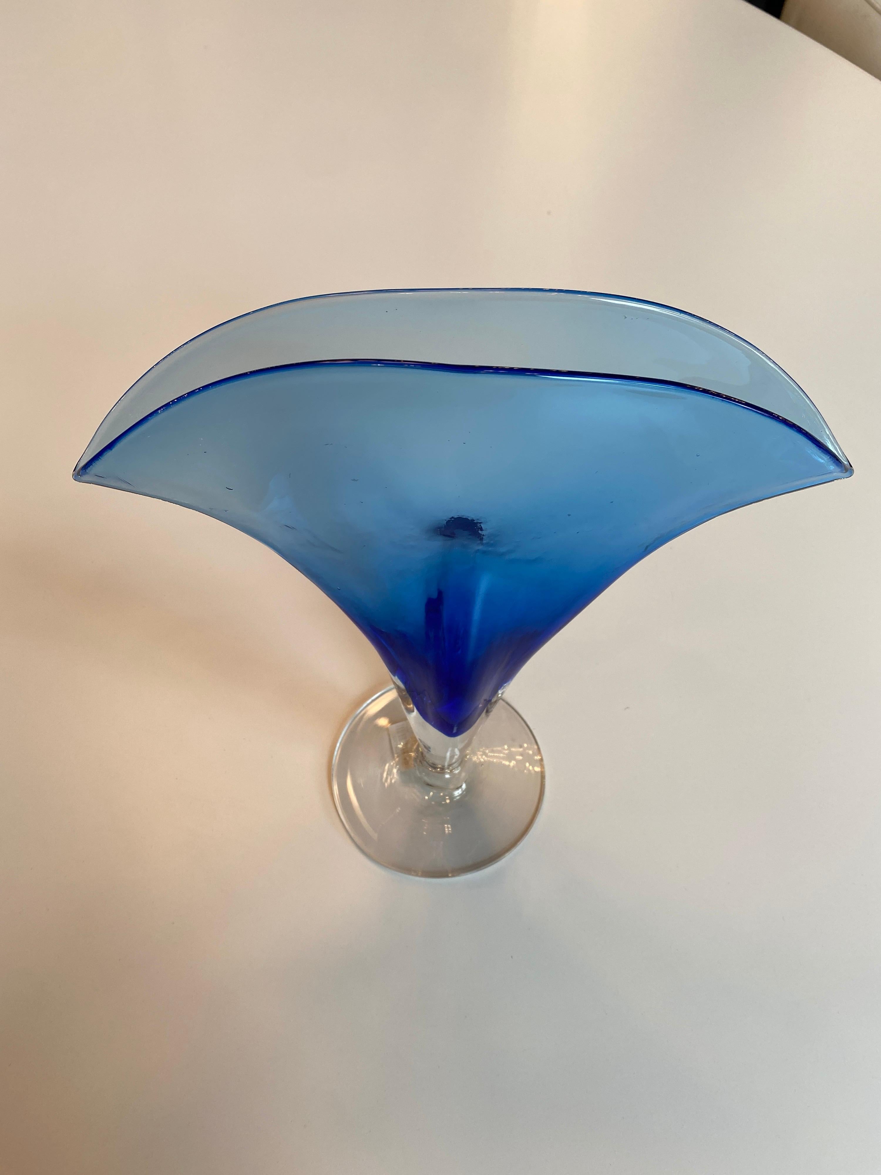 Gorgeous blue glass fan vase.
