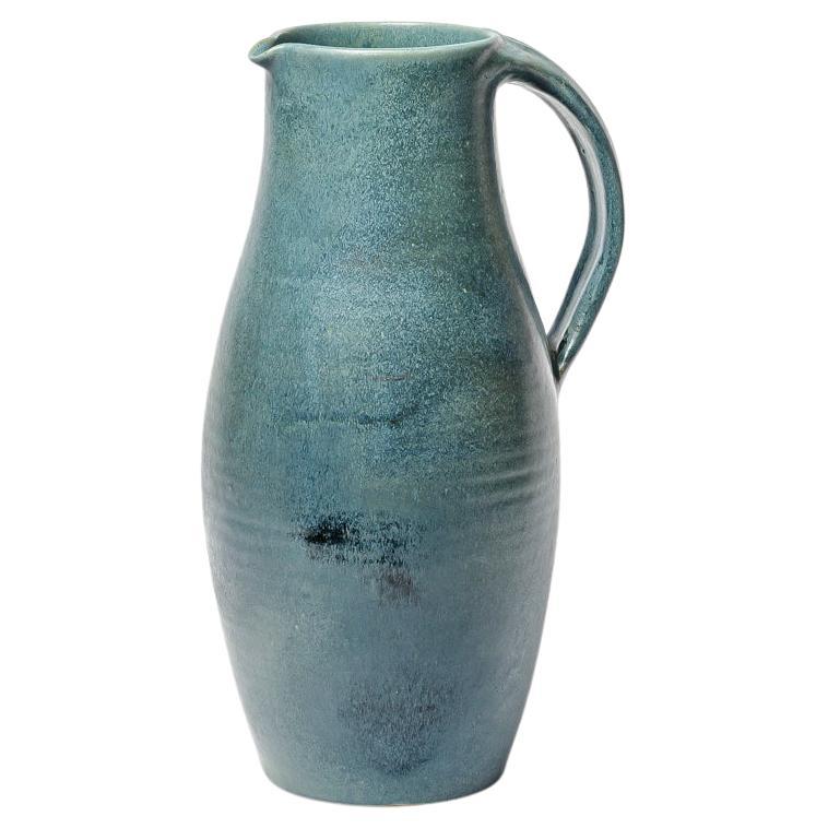 Blue glazed ceramic pitcher by Roger Jacques, circa 1960-1970. For Sale