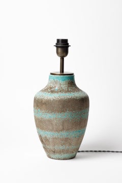 Blue glazed ceramic table lamp in the style of Jean Besnard, circa 1930-1940.