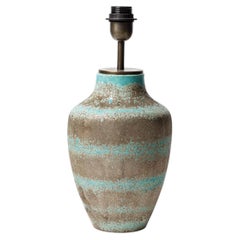 Blue glazed ceramic table lamp in the style of Jean Besnard, circa 1930-1940.