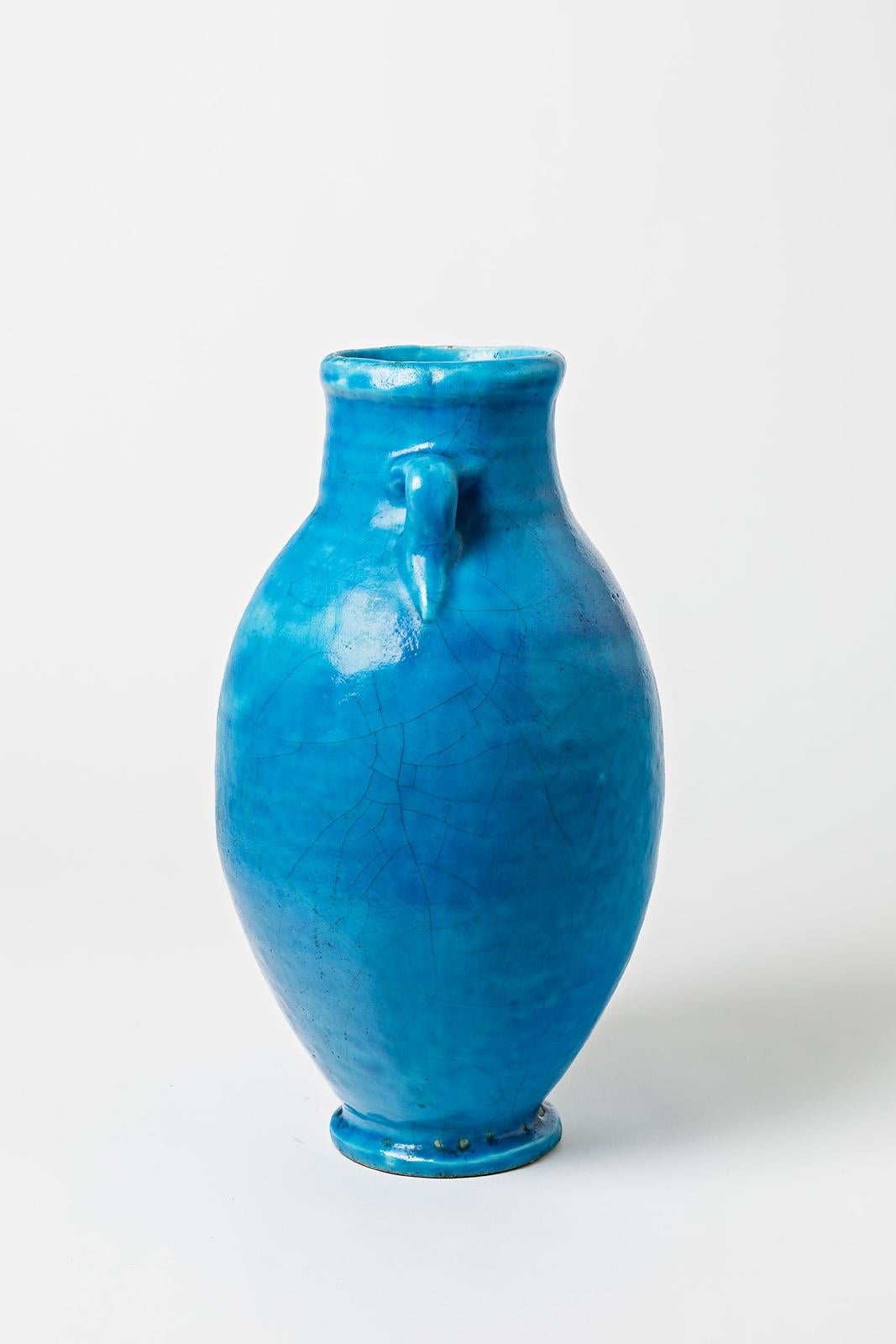 20th Century Blue glazed ceramic vase attributed to Raoul Lachenal, circa 1930. For Sale