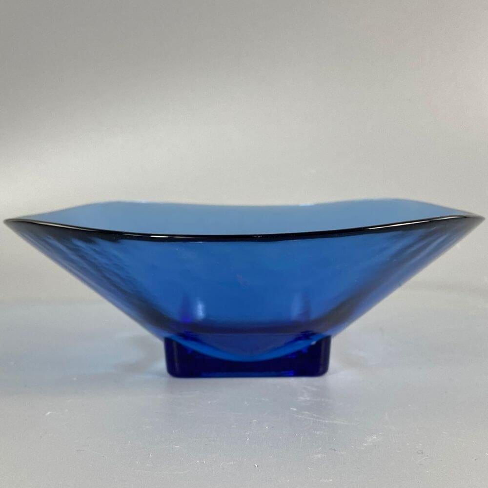 Deep blue decorative glass bowl, offering from the 70s. There is no mark. The glass plays in special opal-pearl colors, its material is unique.

In our studio, we collect exciting pieces, mainly from the European period of the 1930s-1970s. We love