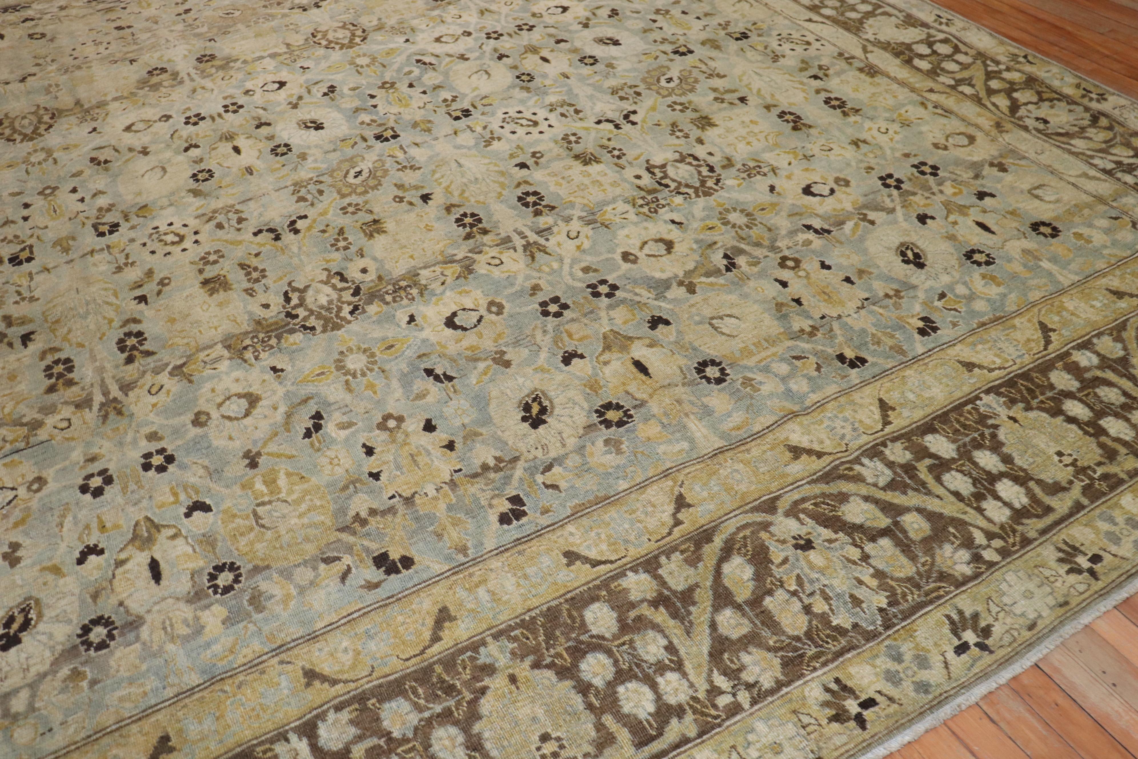 Stunning room size rectangular Persian Tabriz rug with an astonishing large scale all-over palette in stunning gray blue chartreuse, brown dominant accents. The quality is extremely fine, the patina and texture quite fascinating. The piece grabs