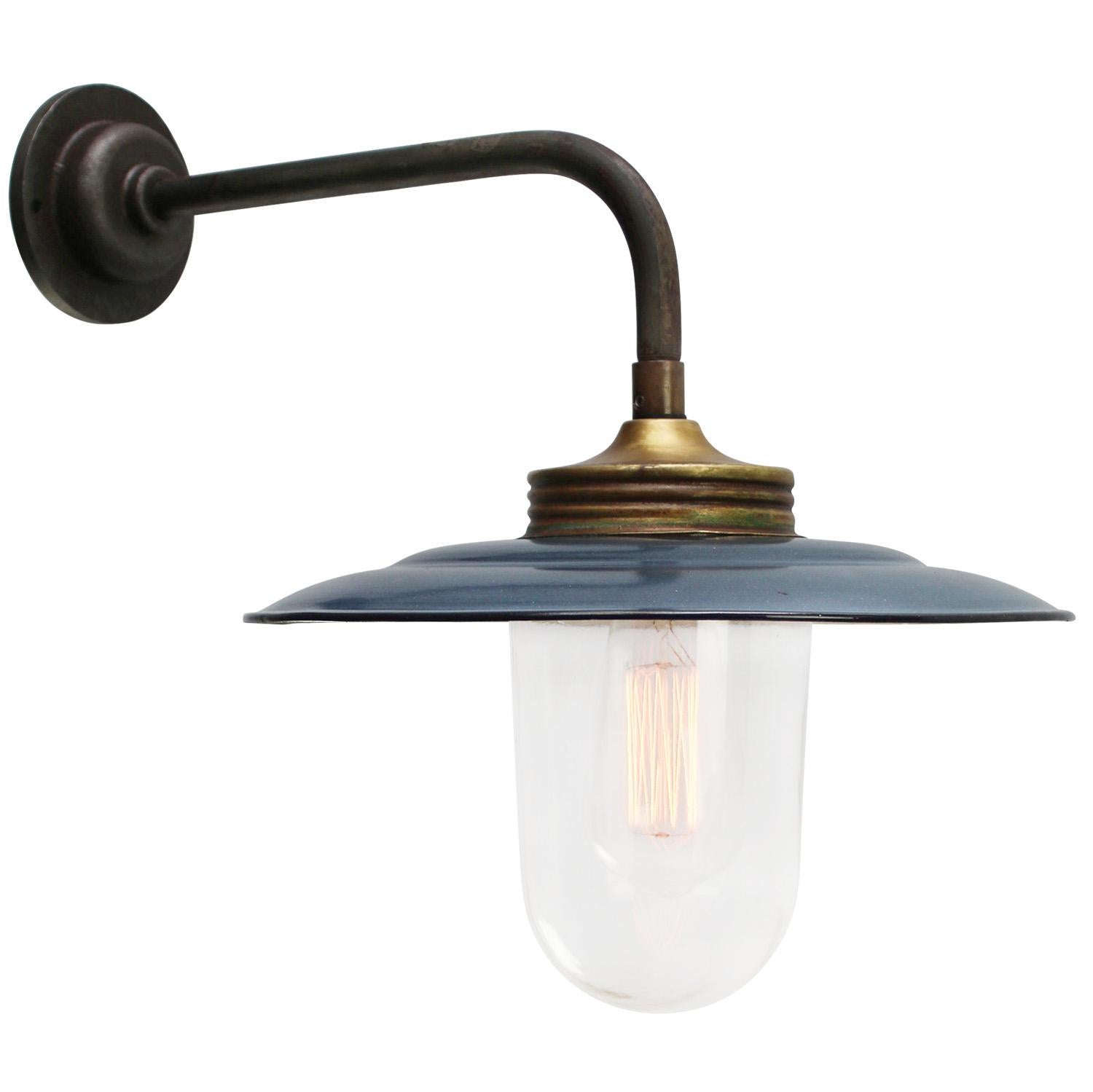 Rust Cast Iron Barn light
Blue Grey enamel, white interior, clear glass

Diameter cast iron wall piece: 10.5 cm / 4 inches
2 holes to secure

Weight: 2.20 kg / 4.9 lb

Priced per individual item. All lamps have been made suitable by international
