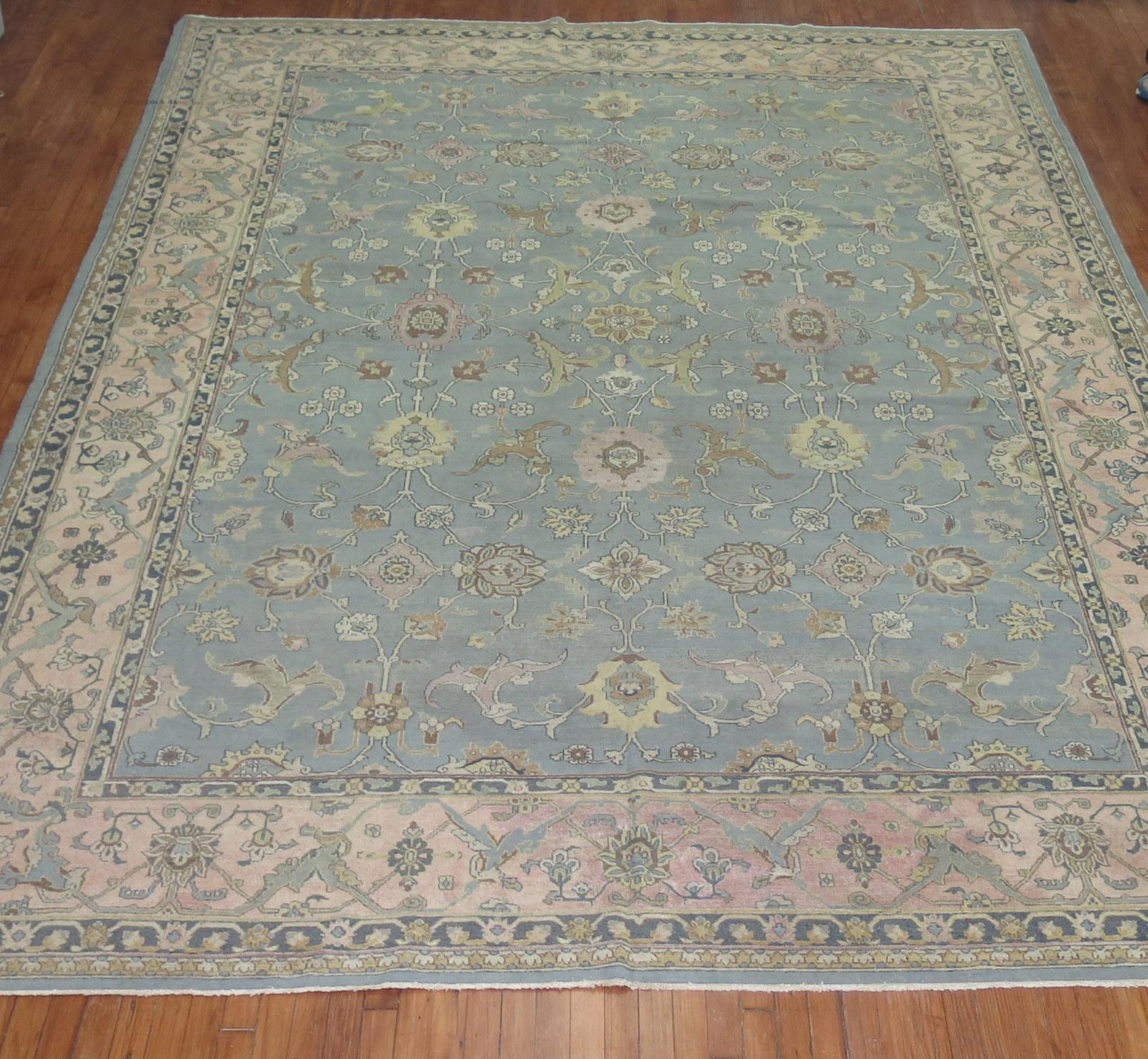 High decorative room size 2nd quarter of the 20th century antique Indo Tabriz rug from the early 20th century. Gray-blue field, accents in gray, ivory, and brown surrounded by a soft pink border

 Measures: 9'6'' x13 '6