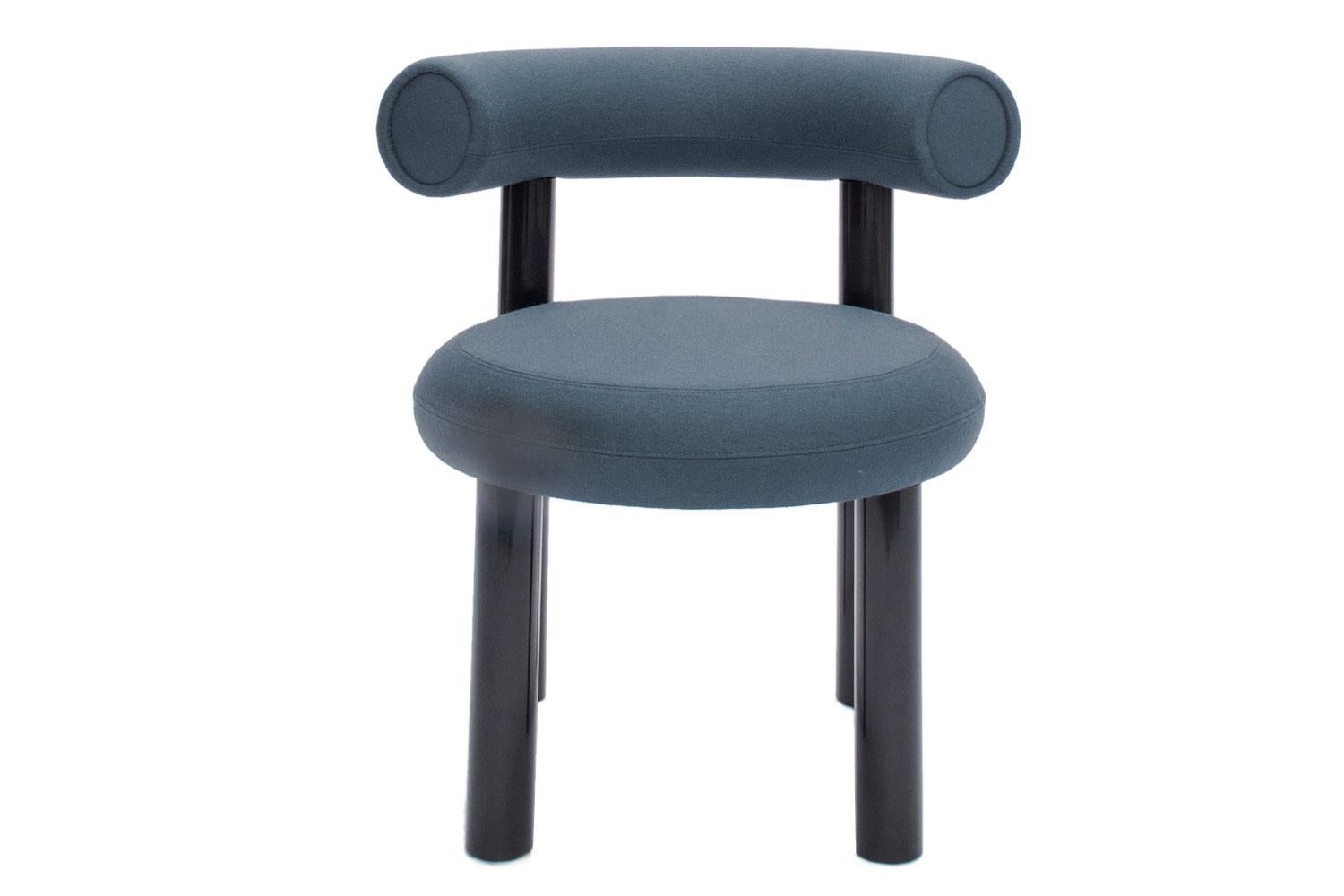 Fat dining chair by Tom Dixon

Designed to hug the body and allowing for multiple sitting positions, this dining chair is upholstered using Hero by Kvadrat blue gray woolen fabric (color 991). Fat is made from moulded foam with a metal leg