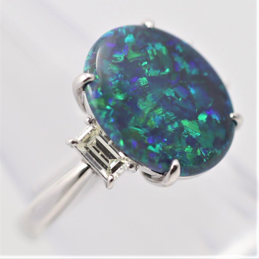 black opal and emerald ring