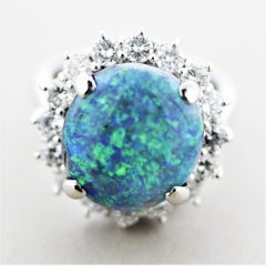 Blue-Green Australian Opal Diamond Halo Platinum Ring
