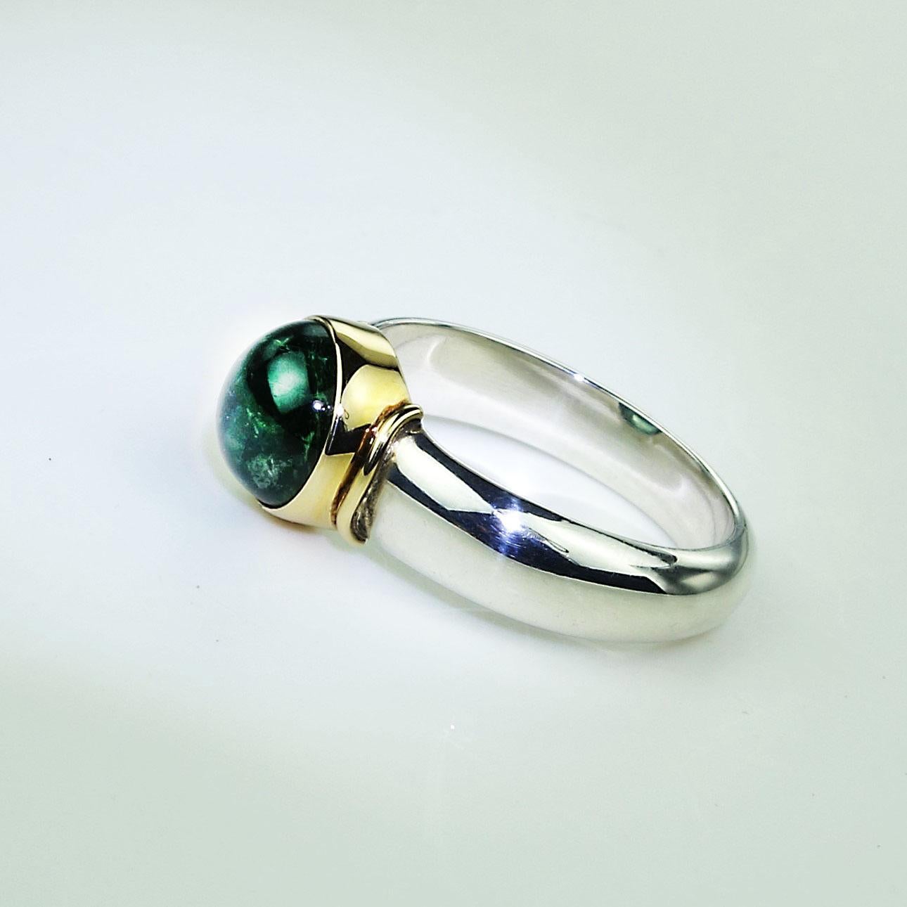 green cabochon ring