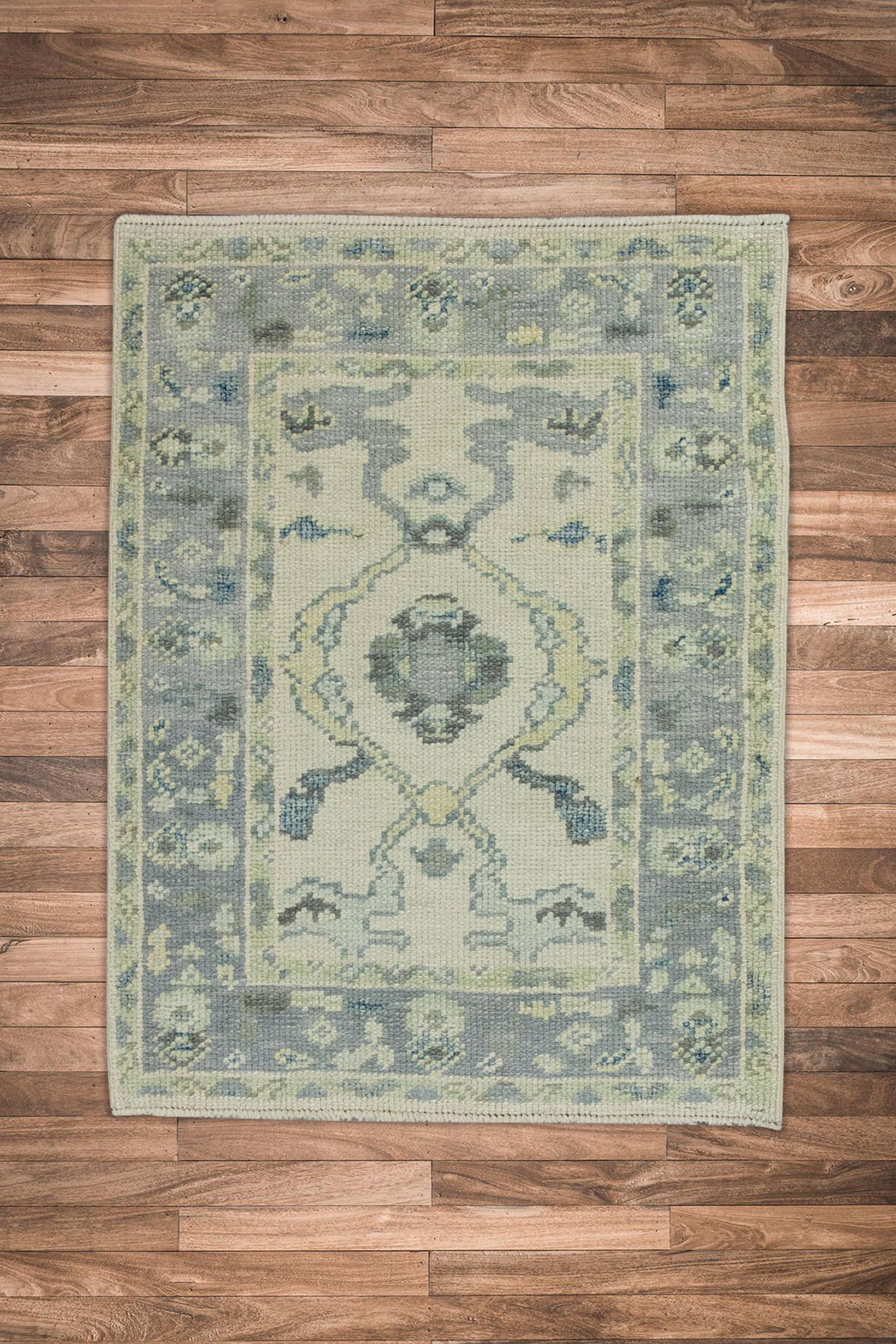 Hand-Woven Blue & Green Floral Design Handwoven Wool Turkish Oushak Rug For Sale