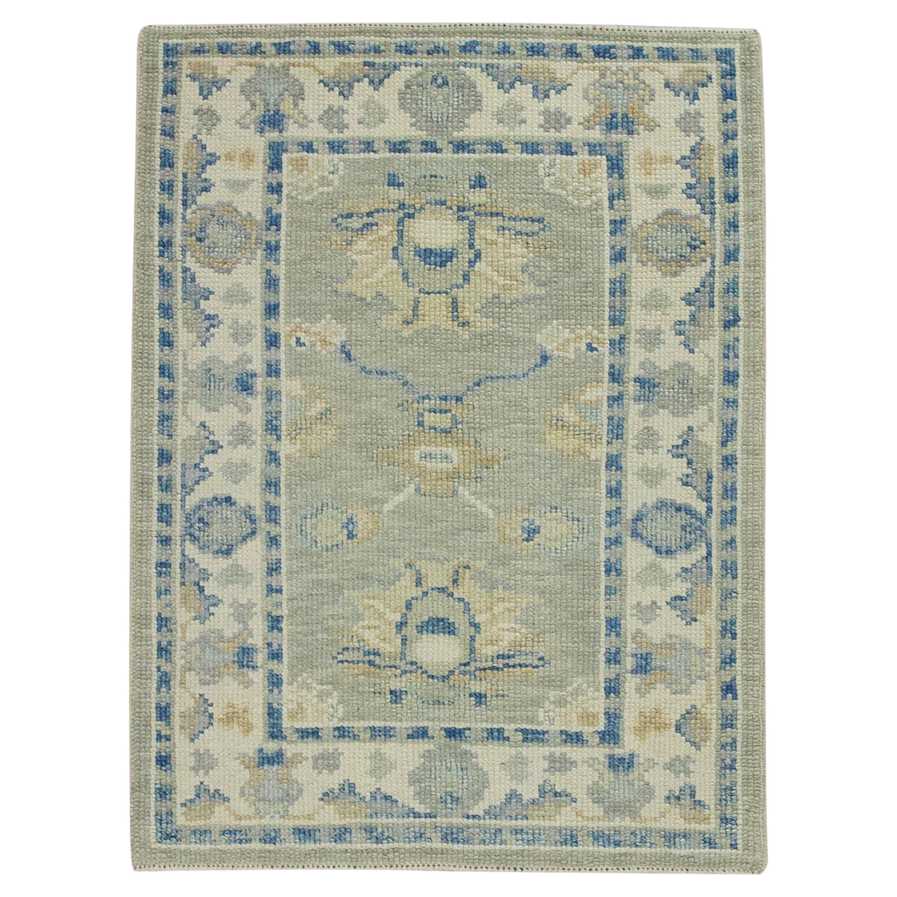 Blue & Green Floral Design Handwoven Wool Turkish Oushak Rug For Sale