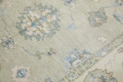 Tapis turc Oushak en laine tissé à la main à motifs floraux bleus et verts, 4'11" x 6'10"