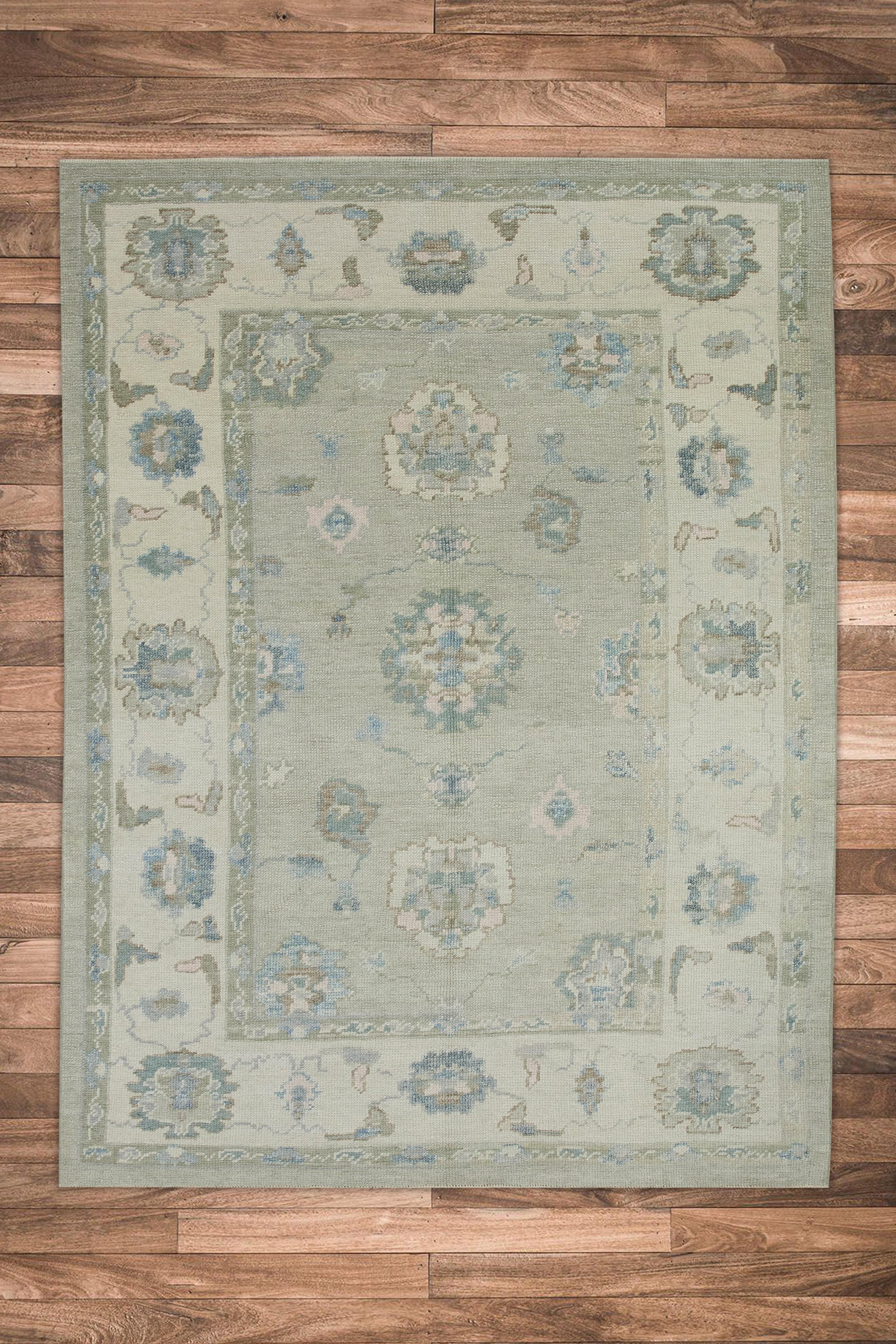 Handgewebter türkischer Oushak-Teppich aus Wolle in Blau & Grün mit Blumenmuster 4'11