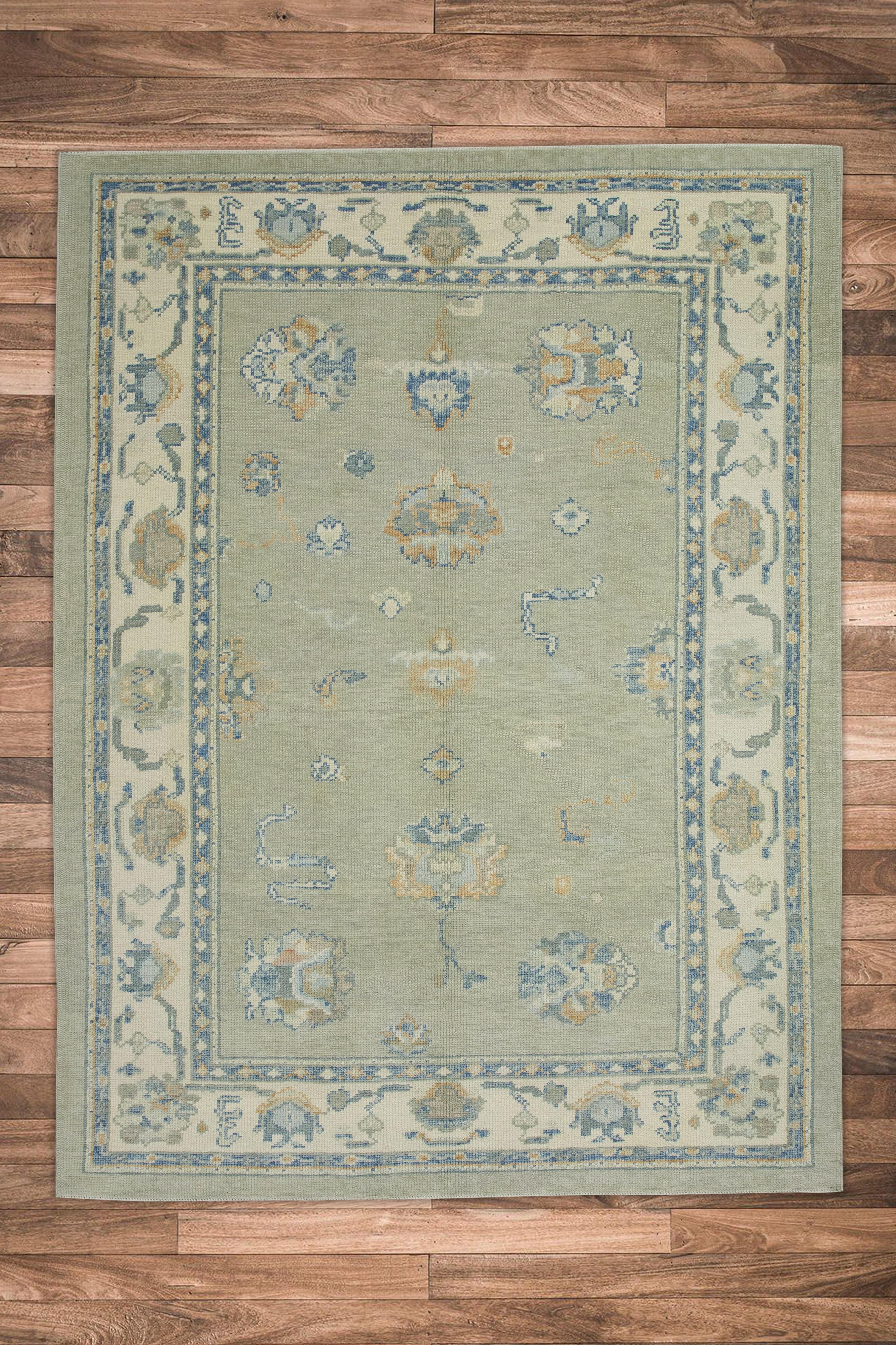 Handgewebter türkischer Oushak-Teppich aus Wolle in Blau & Grün mit Blumenmuster 5'1