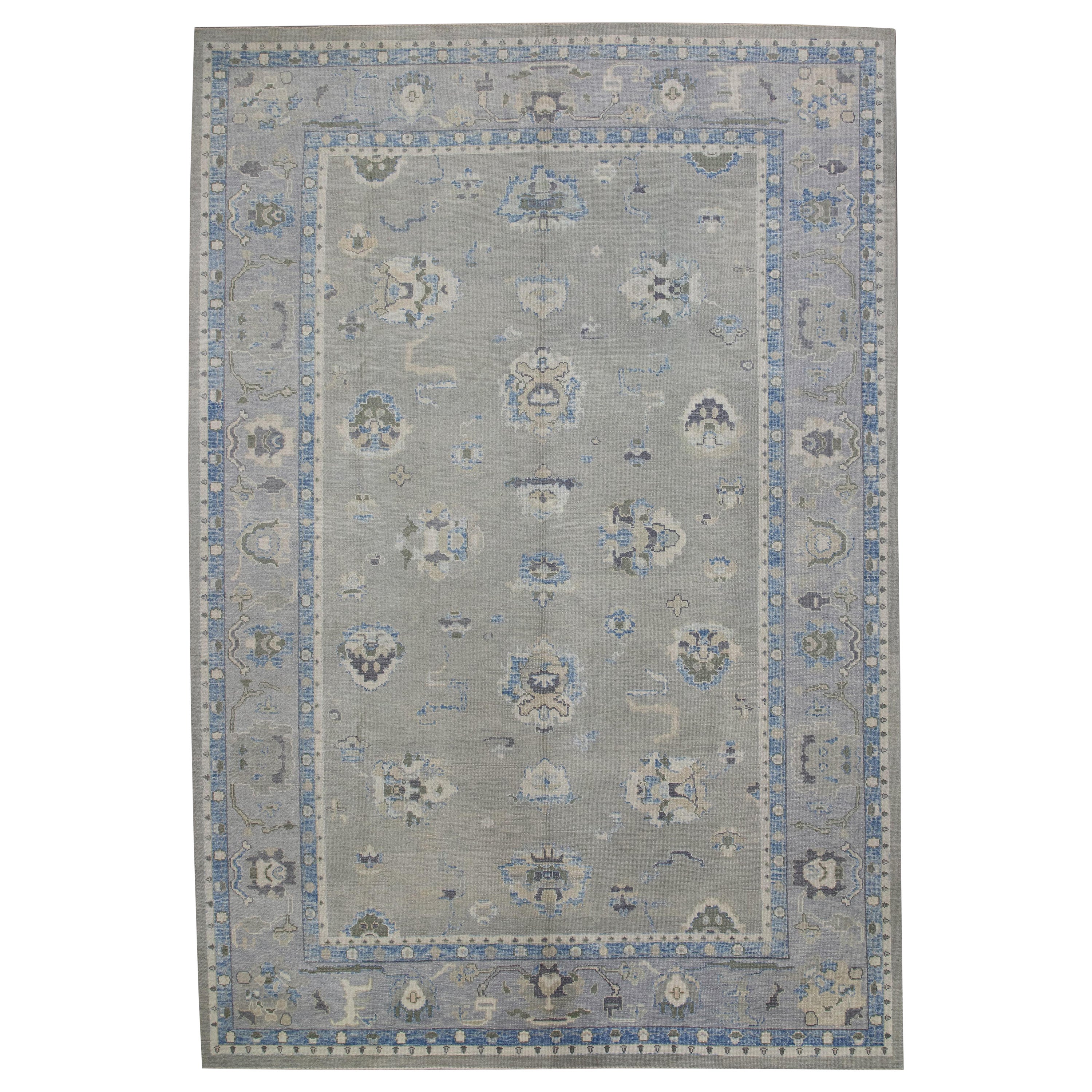 Tappeto Oushak turco in lana intrecciata a mano con disegno floreale blu e verde 9'5" X 14'1".