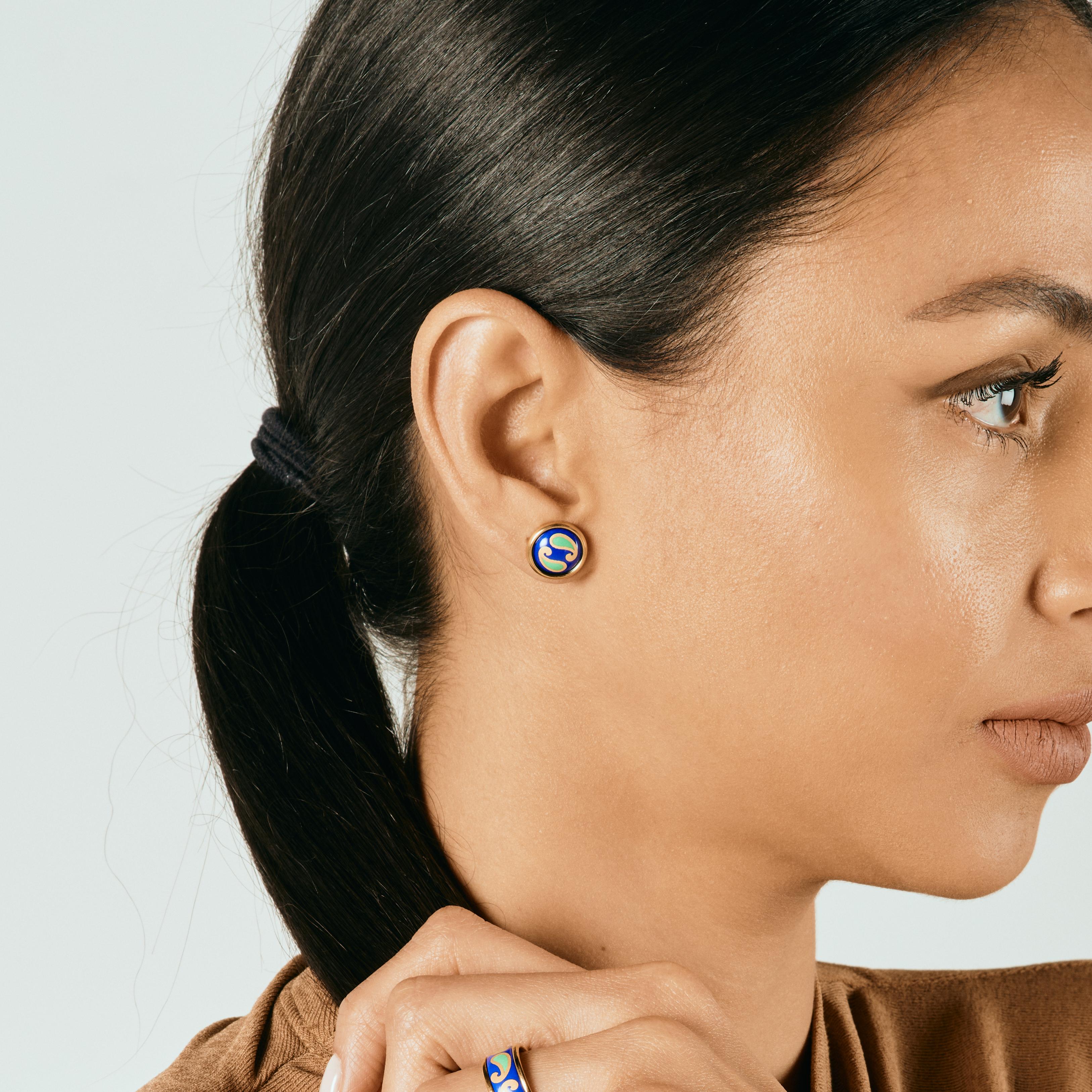 Introducing the Eternity Earrings. 18k gold-plated stainless steel that will not oxidize or discolour, so you can wear your jewelry every day, everywhere. Hand-painted genuine fire enamel will never fade away. Its vivid and radiant colours will last