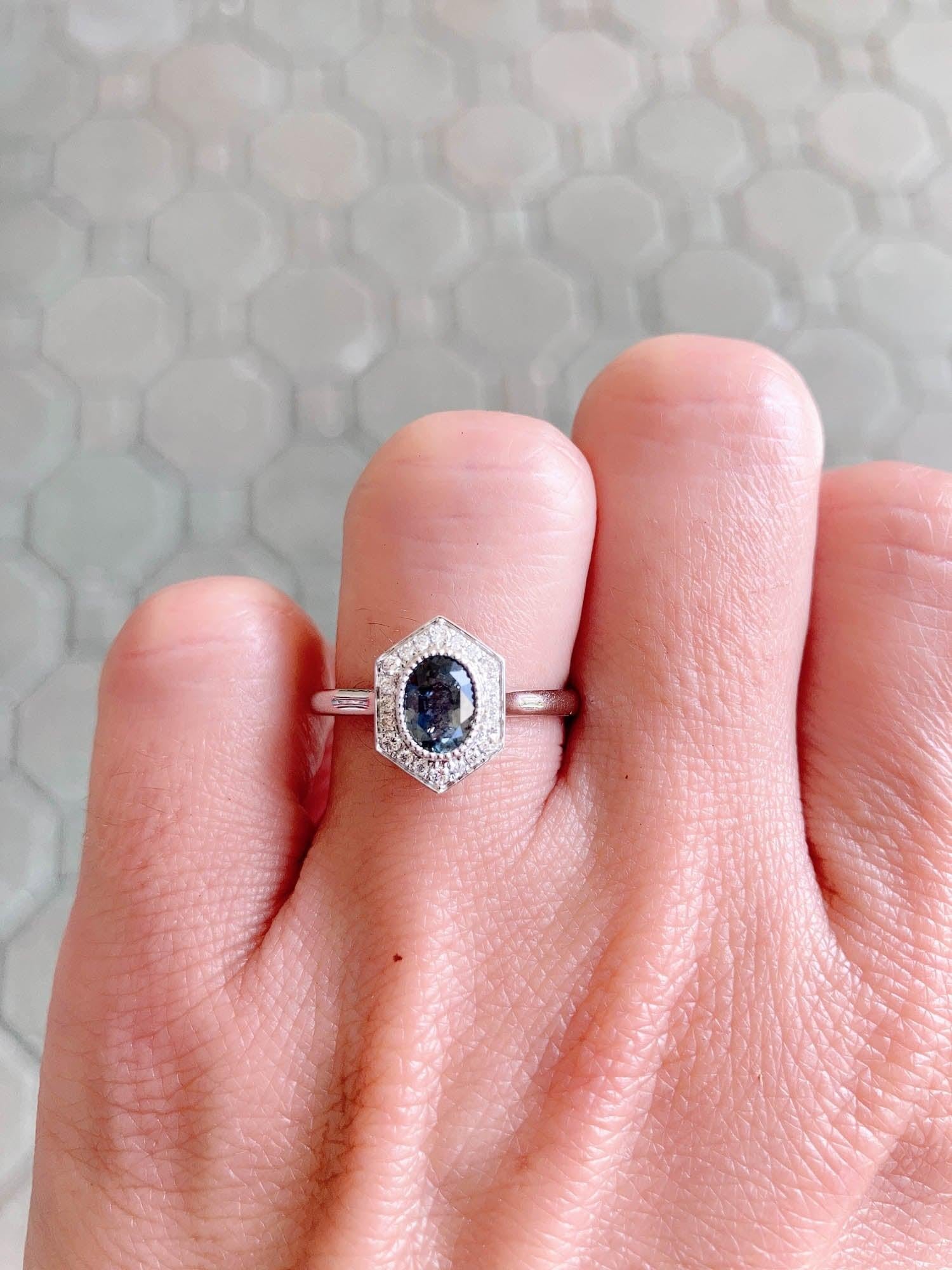♥ Solid 14k white gold ring set with a beautiful oval-shaped teal Montana sapphire with diamond halo
♥ The ring setting measures 11.6 mm in length, 8.6 mm in width, sits 5.3 mm tall on the finger

♥ US Size 7 (Free resizing up or down 1 size)
♥
