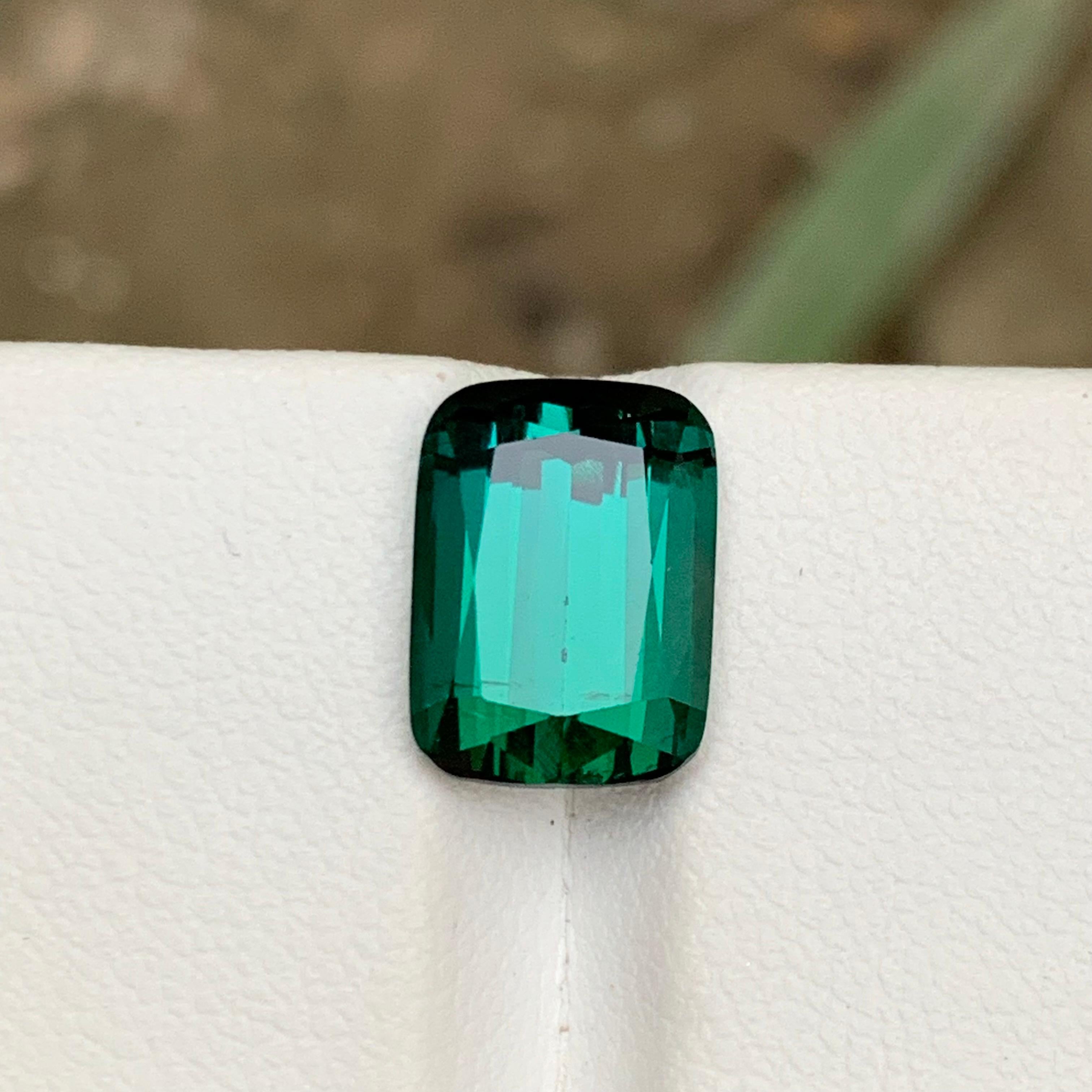Deep Blue Green Natural Tourmaline Gemstone from Kunar Afghanistan!!

💎 GEMSTONE TYPE: Tourmaline
⚖️ WEIGHT: 4.90 Carats
🪚 SHAPE & CUT: Cushion Cut
📏 SIZE (MM): 11.12 x 8.22 x 6.38
🌈 COLOR:  Blue Green
🔎 CLARITY: Approximately Eye Clean
🧪
