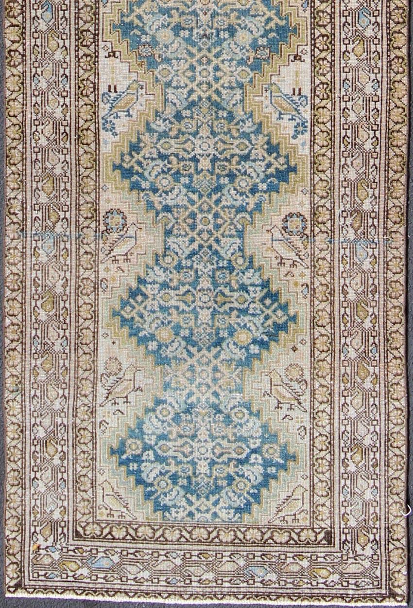Blue green, teal, brown, yellow and yellow green antique Persian Malayer runner. na-180020, country of origin / type: Iran / Malayer, circa 1920.

This magnificent antique Persian Malayer runner, of an impressive size, bears a beautiful tribal