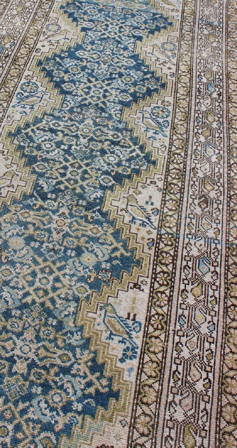 Early 20th Century Blue Green, Teal, Brown, Yellow and Yellow Green Antique Persian Malayer Runner