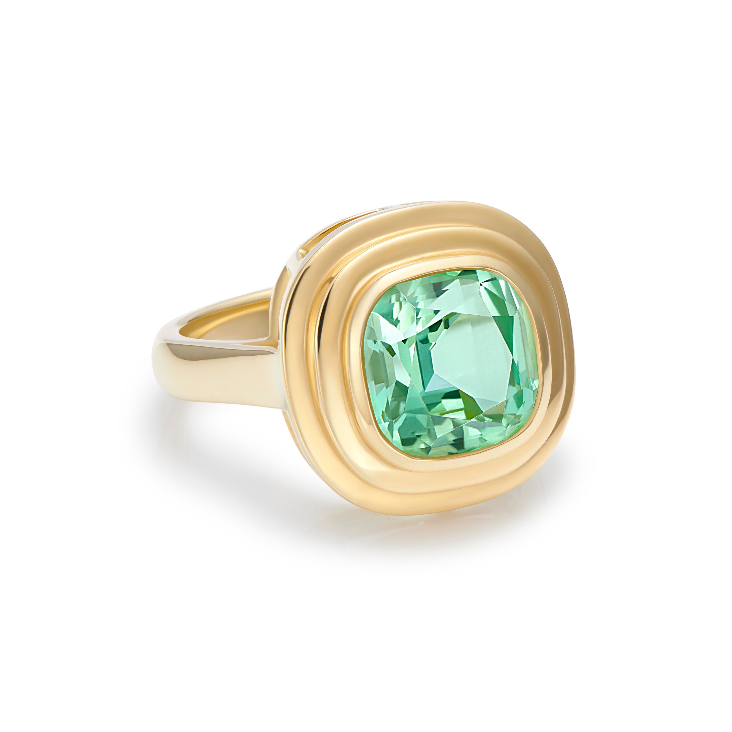 A stunning blue/green Tourmaline set into 18 karat yellow gold, Athena ring. 
Tourmaline comes in a variety of colours, green being the most popular and this gorgeous stone is a such an eye catching colour. 

Tourmaline is the birthstone for October