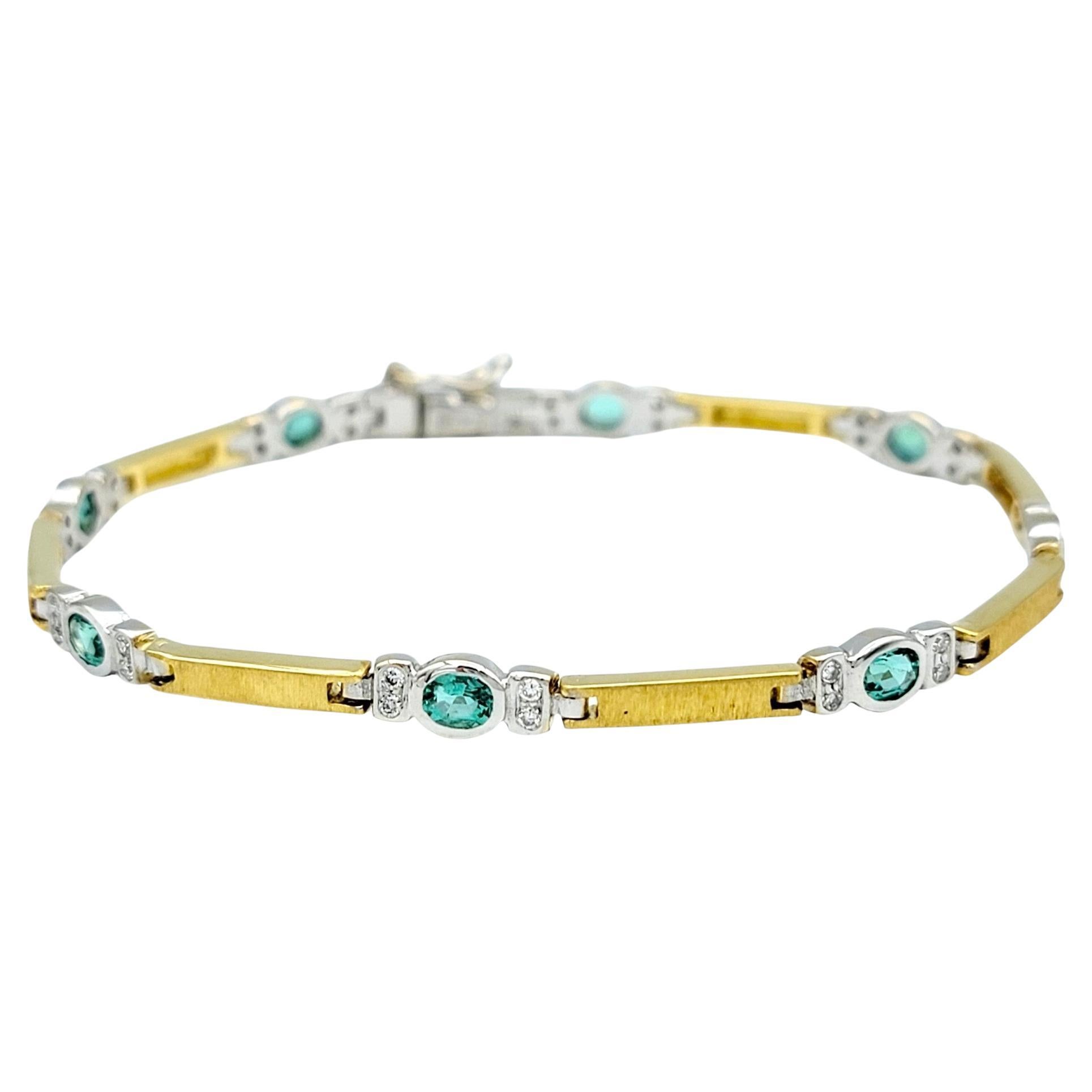 The inner circumference of this bracelet measures 6.88 inches and will comfortably fit a 6.25 - 6.75 inch wrist. 

This beautiful tourmaline and diamond link bracelet, crafted in luxurious 18 karat yellow and white gold, presents a stunning