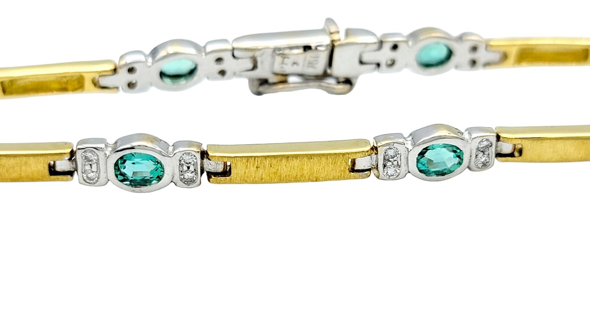 Oval Cut Blue-Green Tourmaline and Diamond Link Bracelet Set in Two-Tone 18 Karat Gold For Sale