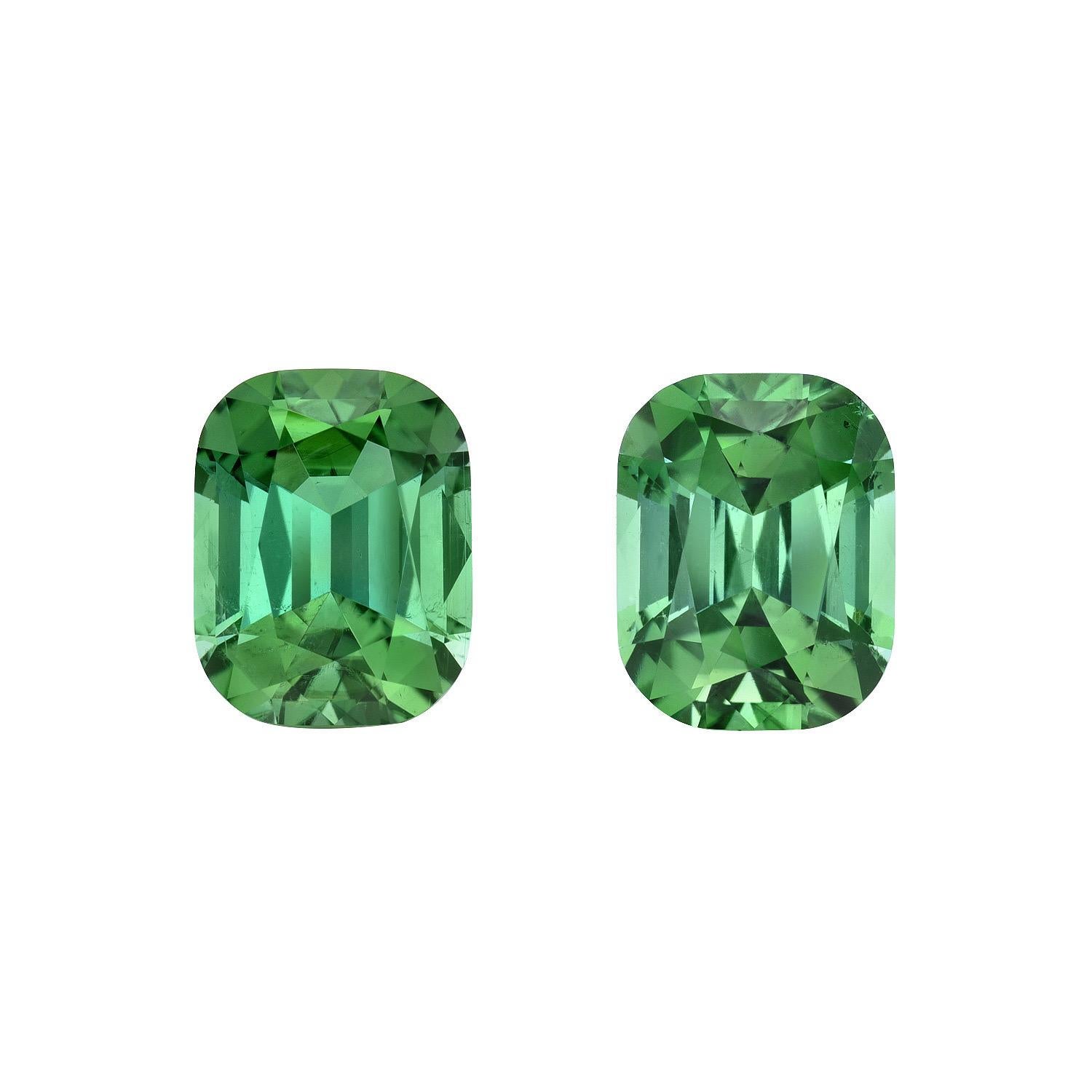 Supreme mismatched pair of 3.61 carat 
