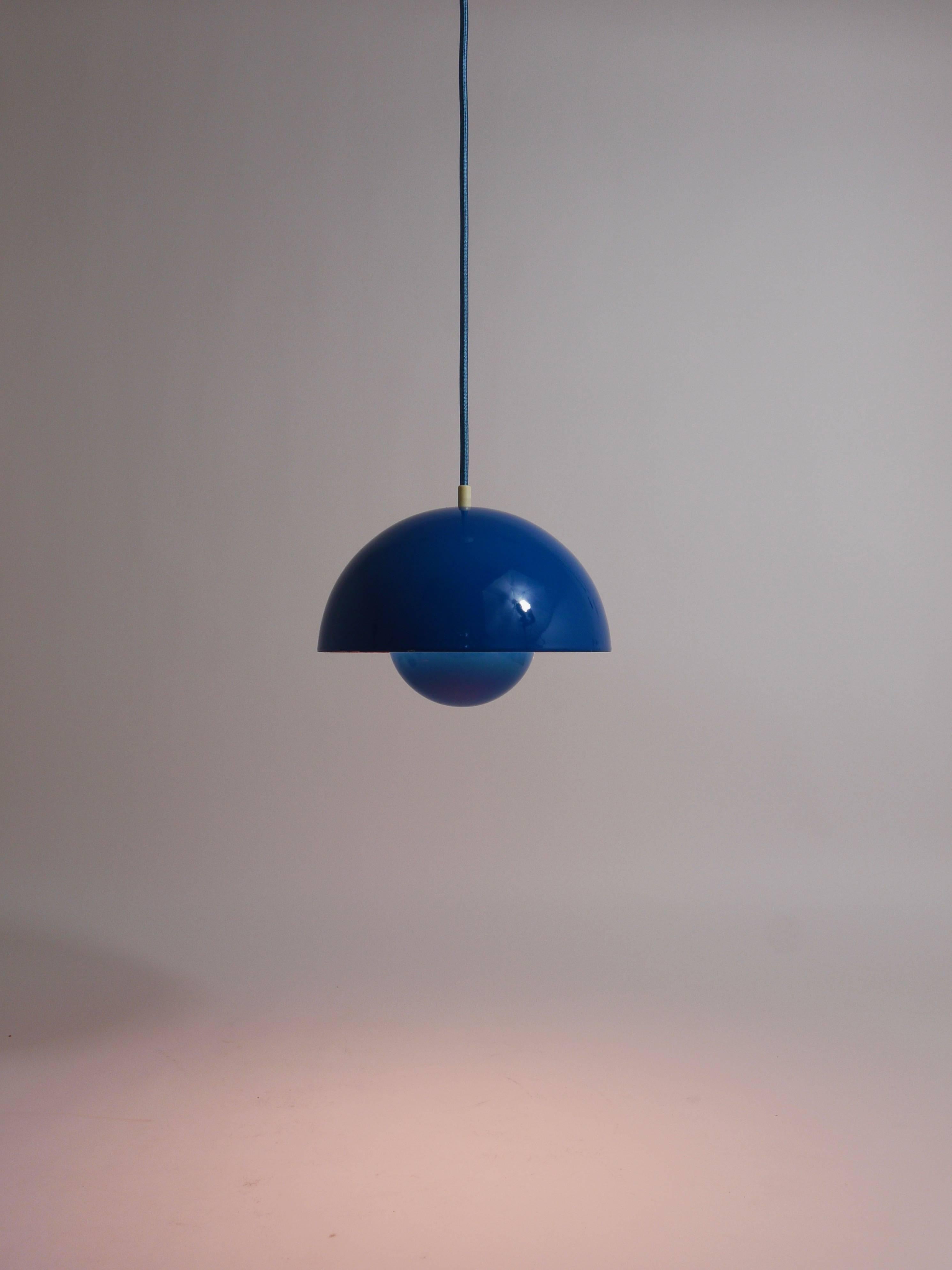 An iconic petrol-blue flowerpot pendant light, designed in 1969 by Verner Panton for Louis Pulsen, Denmark. Rare blueish-green color, appears more green than on the images. A simple but beautiful ceiling light, consisting of two enameled