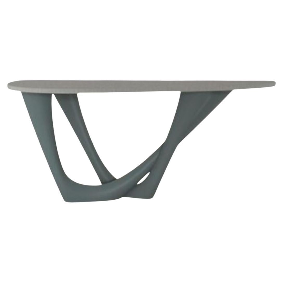G-Console Duo grigio blu con piano in cemento e base in acciaio di Zieta