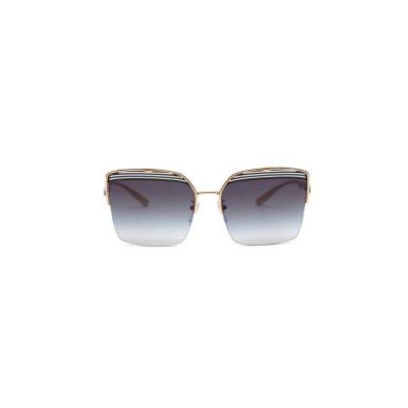  Bvlgari blue & grey gradient lens square frame sunglasses
 
 
 
 - Narrow gold-tone metal square frame with cut-out detailing
 
 - Two-tone ombre lenses
 
 - Clear nose pads
 
 
 
 Material
 
 Metal 
 
 Polycarbonate lenses
 
 
 
 Made in Italy 
 

