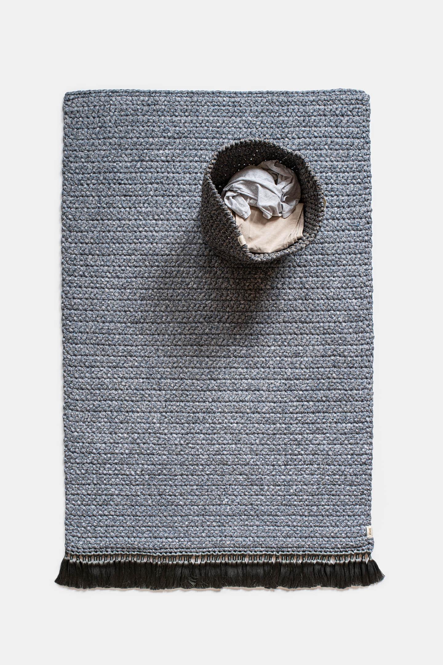 IOTA rugs are thick, soft, hand knit and luxurious, 3 times thicker than the standard rug. The Two Tone medium rugs create a subtle gradient that will light up any space, suitable for an intimate corner in the living space as well as for bedrooms,