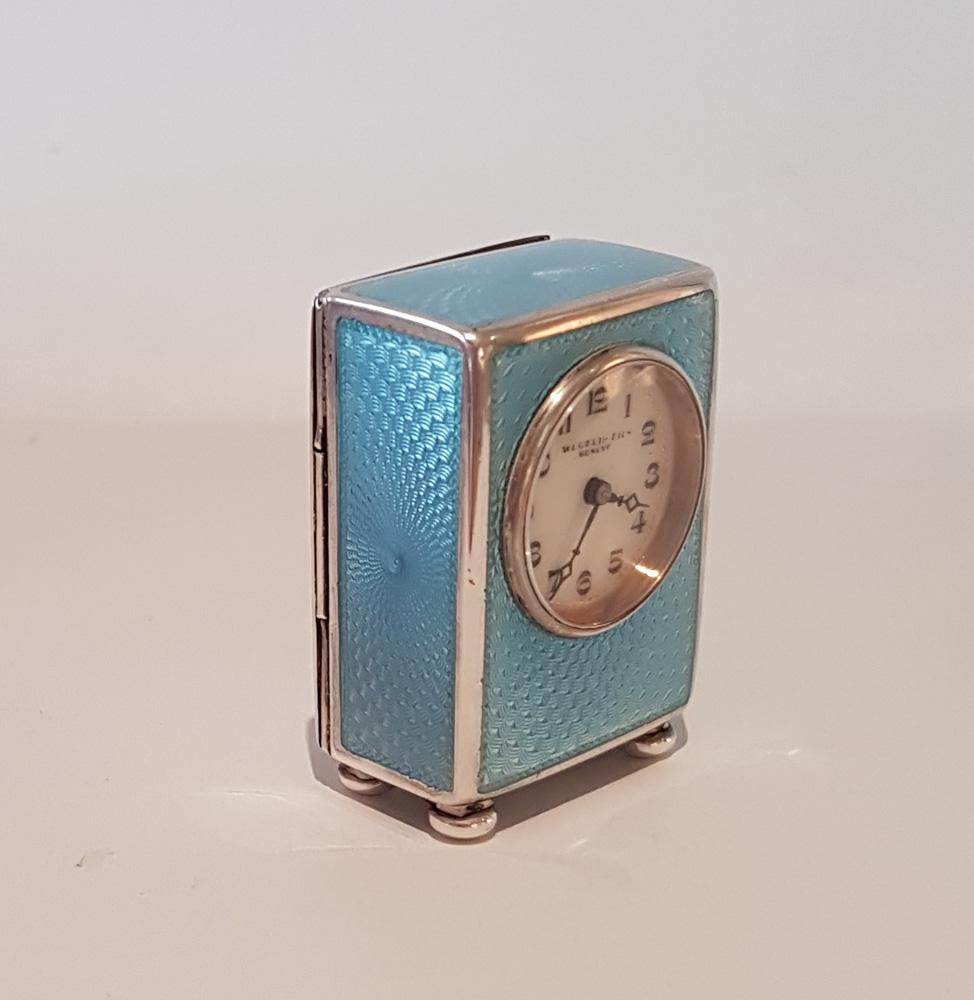 A fine swiss blue guilloche enamel and silver sub-miniature carriage or boudoir clock. A very small sub- miniature by Wegelin and Fils, Geneva with high quality 3/4 plate movement. The clock is in superb condition, with no damage to the enamel. The