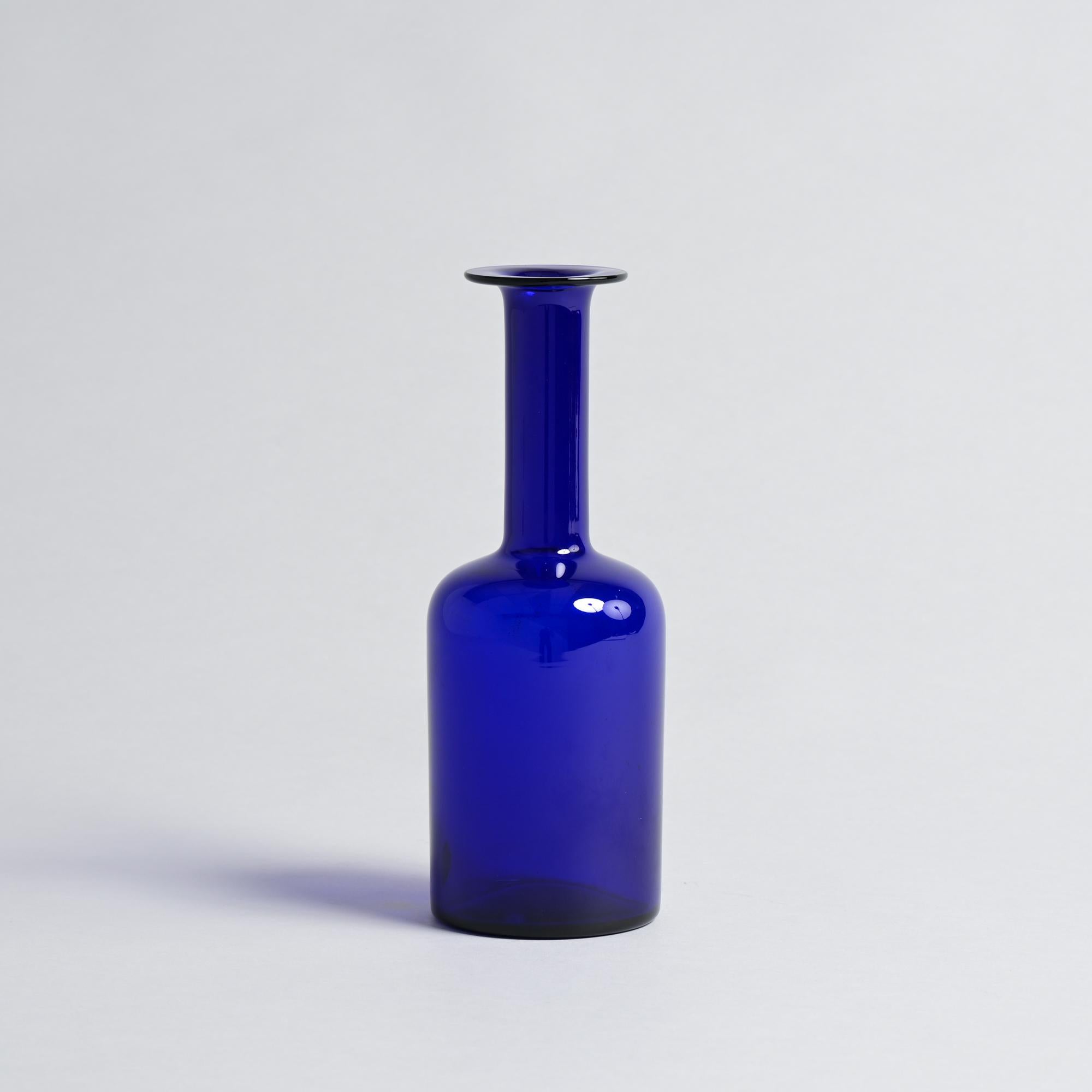 This remarkable blue gulvase vase was designed by Otto Brauer and manufactured by Holmegaard.

The Holmegaard Glass Factory was founded in 1825, making it one of Denmark’s oldest glassworks. It is known for its high-quality Danish-designed