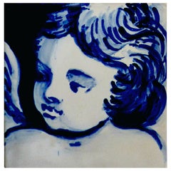 Mattonella di ceramica blu dipinta a mano con cherubino o angelo portoghese Azulejo