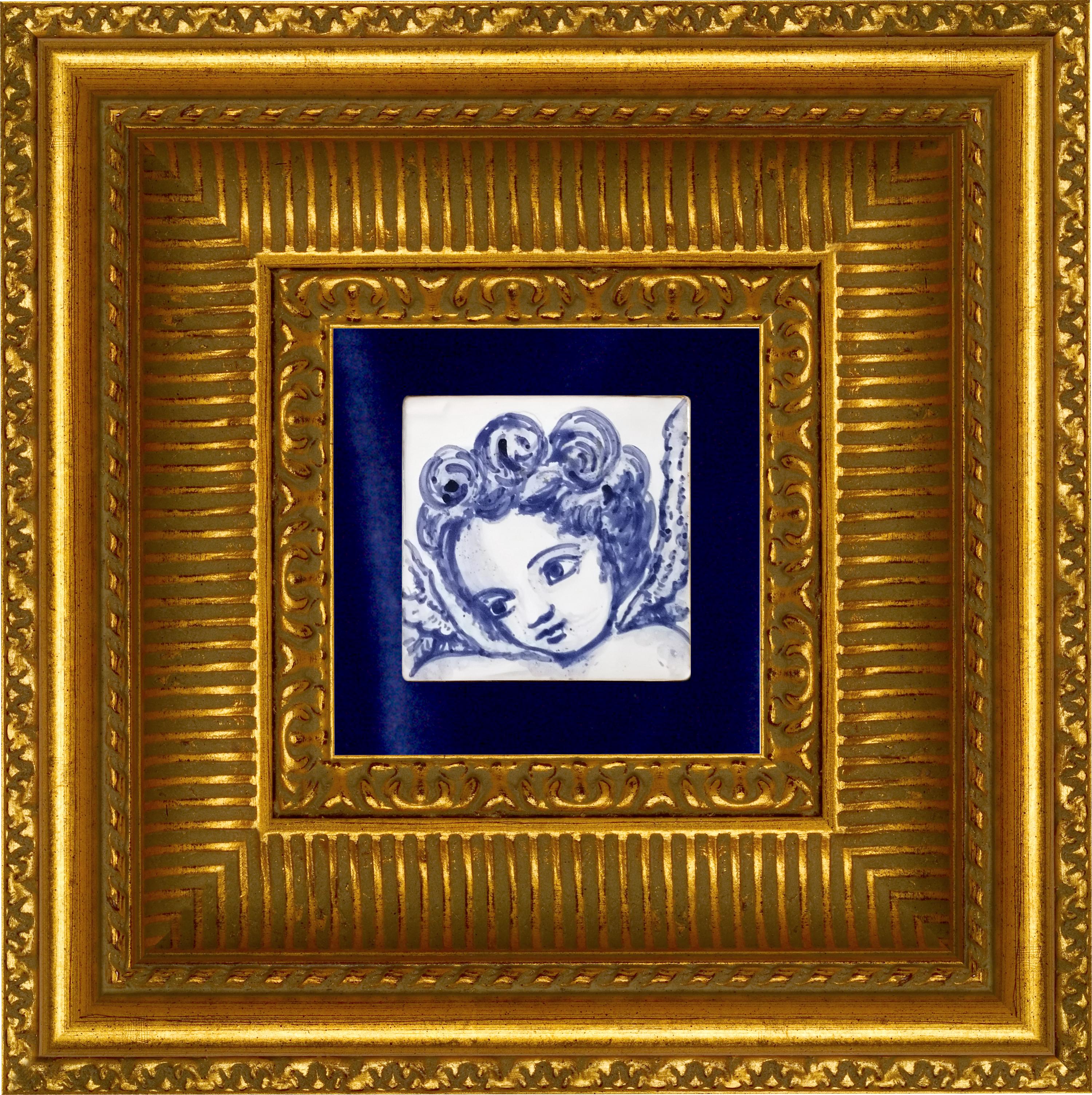 Superbe carreau de céramique portugais/azulejo bleu peint à la main, de style baroque, représentant un angelot ou un ange, datant du 18e siècle
Le carreau peint en bleu cobalt sur fond blanc, typique du Portugal du XVIIIe siècle, a donné le goût
