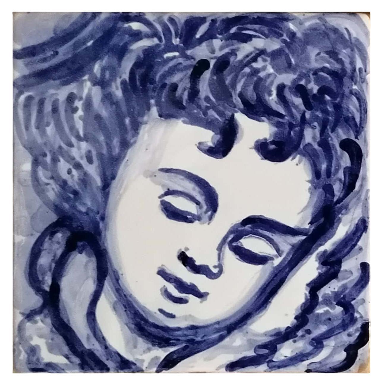 Blauer handbemalter Barock-Keramikfliesen oder Azulejo aus portugiesischer Keramik, Cherub oder Engel
