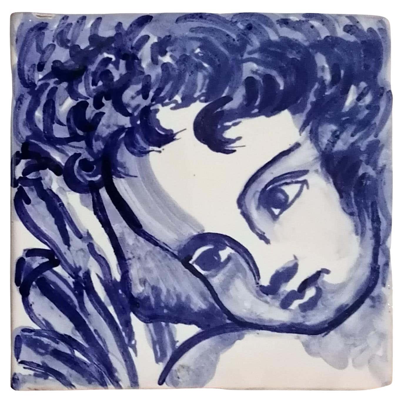 Blauer handbemalter Barock-Keramikfliesen oder Azulejo aus portugiesischer Keramik, Cherub oder Engel