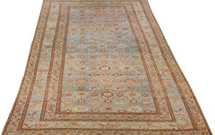 Blauer handgefertigter antiker persischer Malayer-Wollteppich mit Blumenmuster