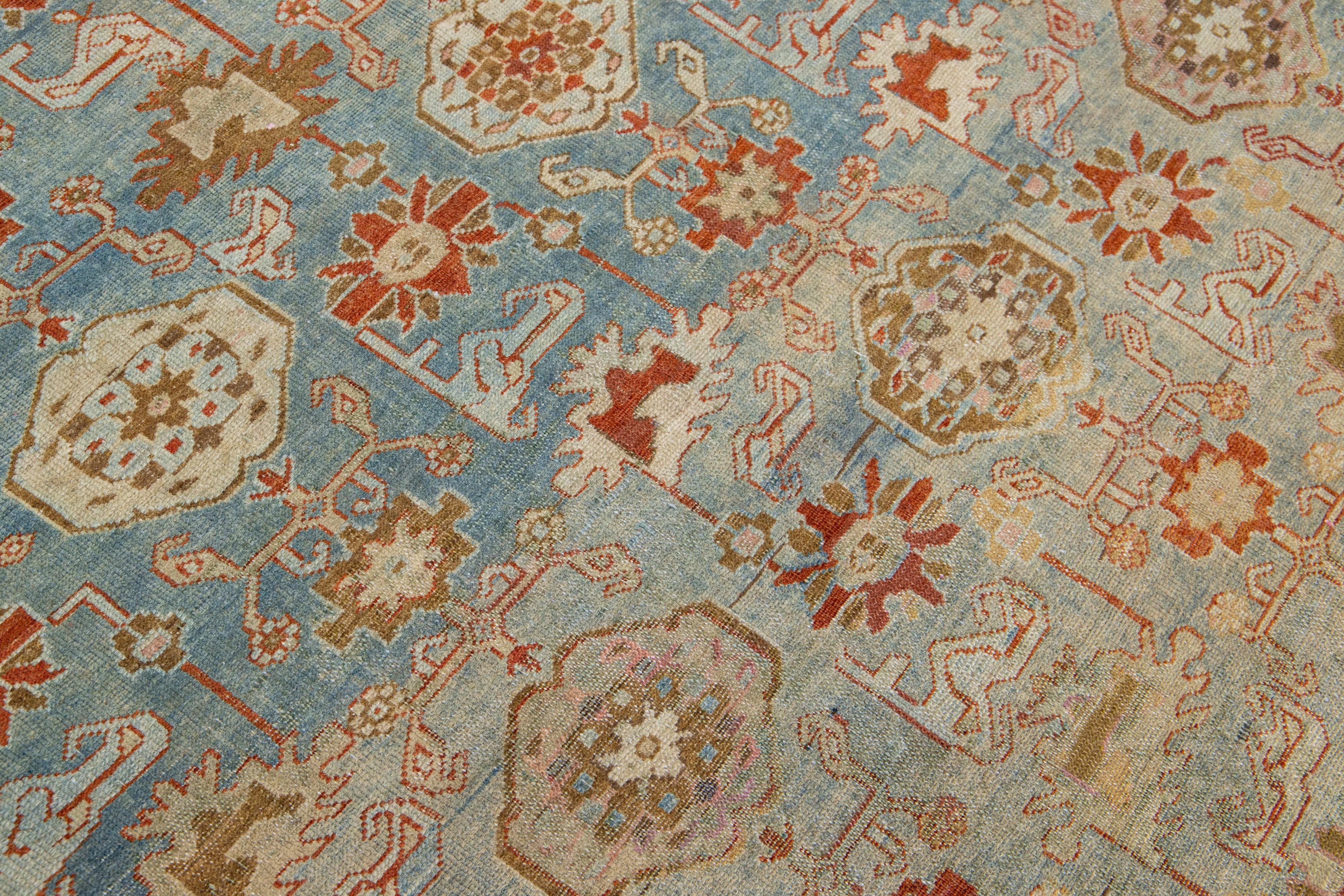 Blauer handgefertigter antiker persischer Malayer-Wollteppich mit Blumenmuster (Wolle) im Angebot