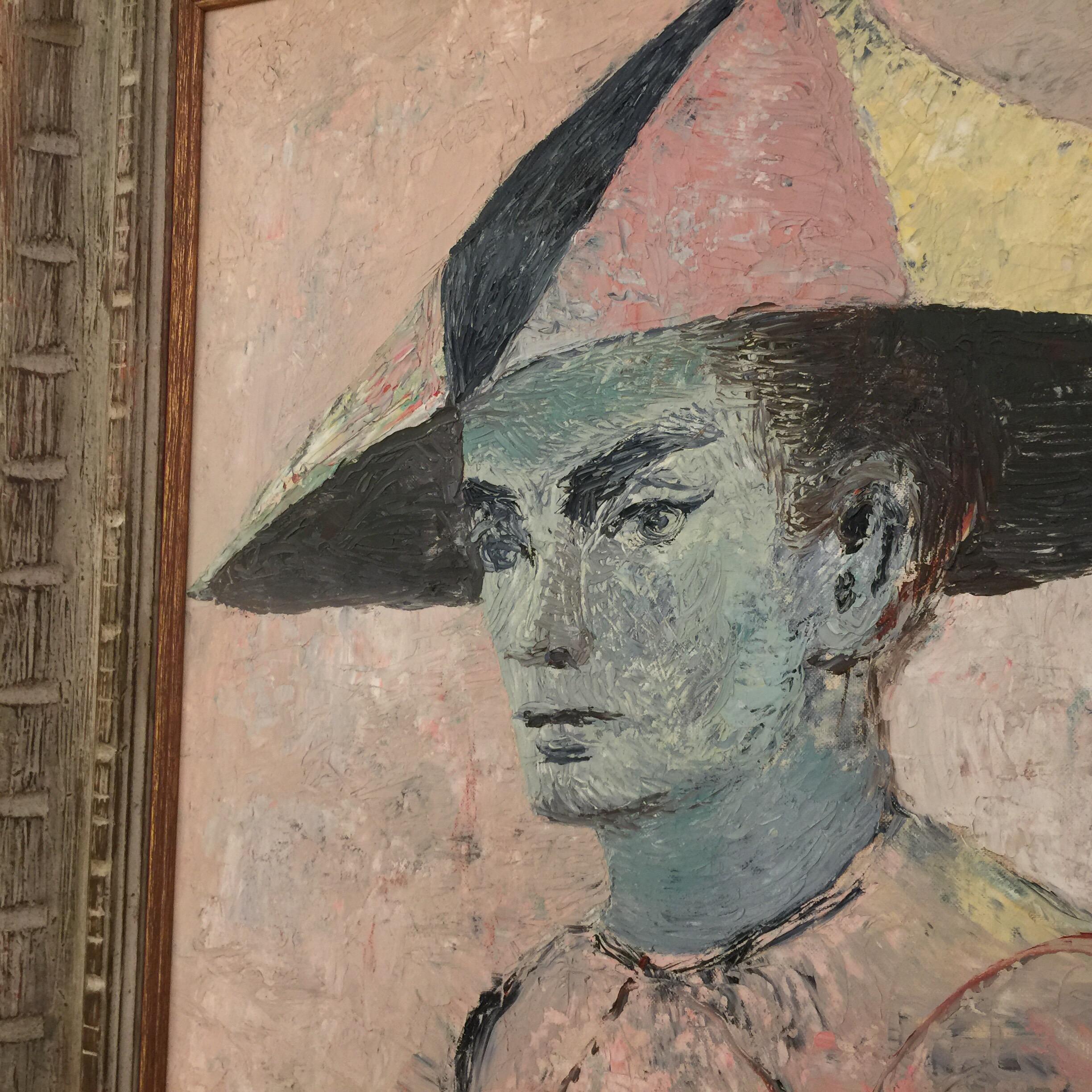 Questo dipinto vintage su masonite di un arlecchino blu, in omaggio a Pablo Picasso, è un'opera d'arte splendidamente incorniciata. La tavolozza morbida e la cornice antica sono davvero mozzafiato. Si tratta di un dipinto non firmato sul davanti, ma