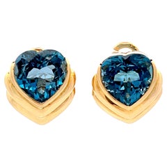 Blue Heart Shaped Topaz Earrings in 18k Yellow Gold