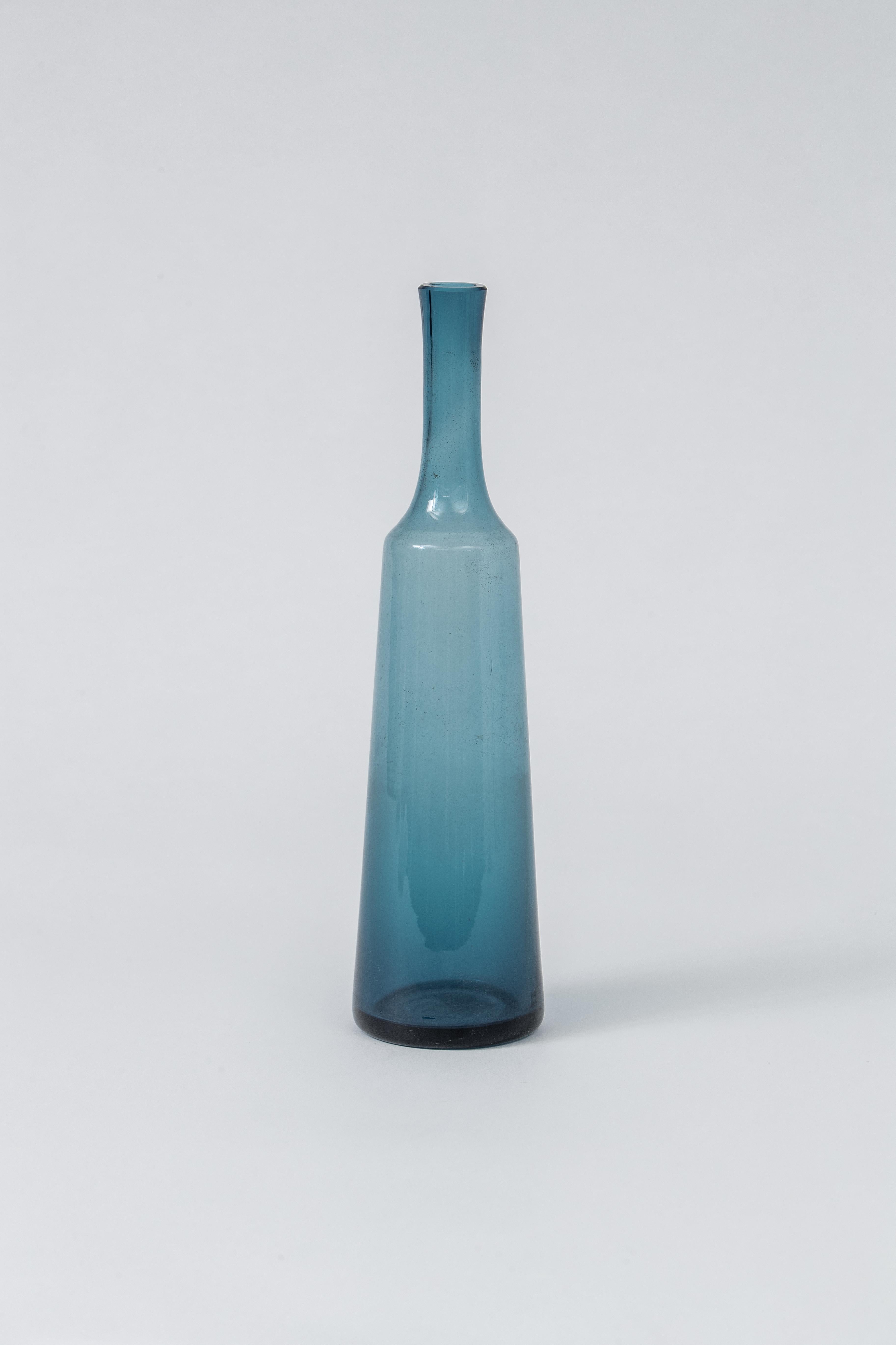 Handsome blue bottle by Holmegaard of Denmark.