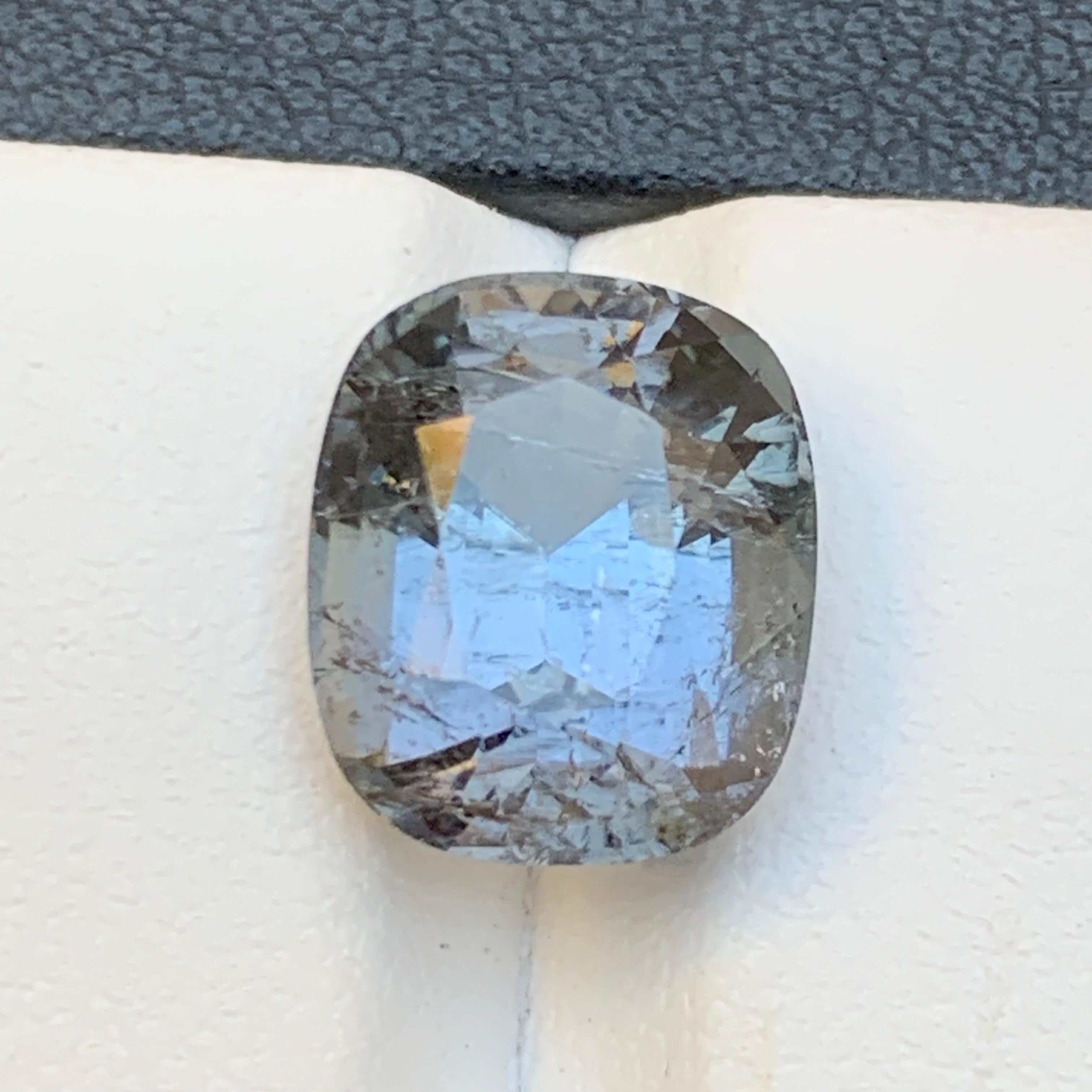 Blue Hue Grey Natural Tourmaline Loose Gemstone for Ring, Necklace Pendant, or any other Jewelry Setting-Cushion Cut from Afghanistan!!

💎 GEMSTONE TYPE: Tourmaline
⚖️ WEIGHT: 6.80 Carats
🪚 SHAPE & CUT: Cushion Cut
📏 SIZE (MM): 11.93 x 10.02 x